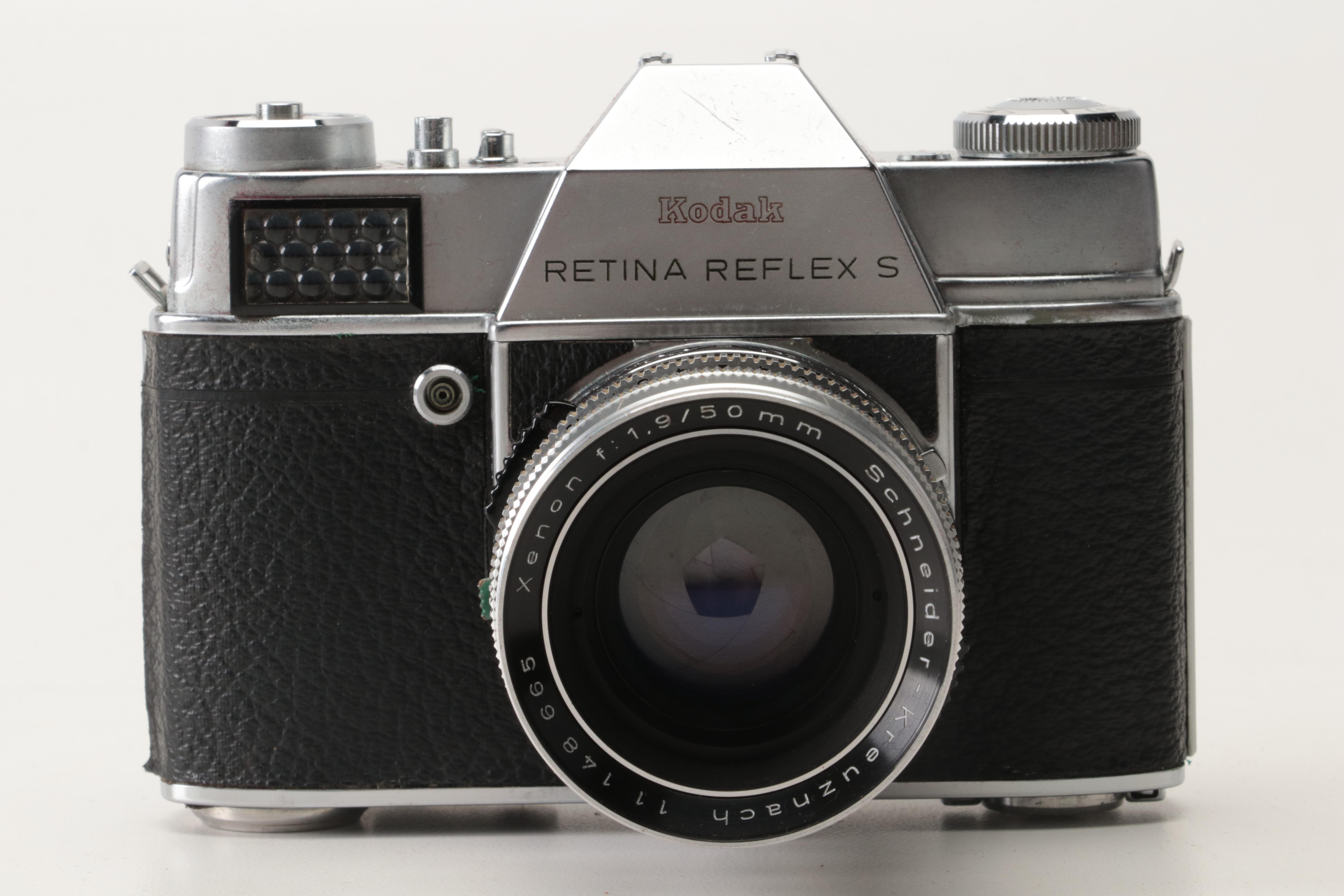 Collection of Kodak Retina Reflex Cameras With Leather Cases