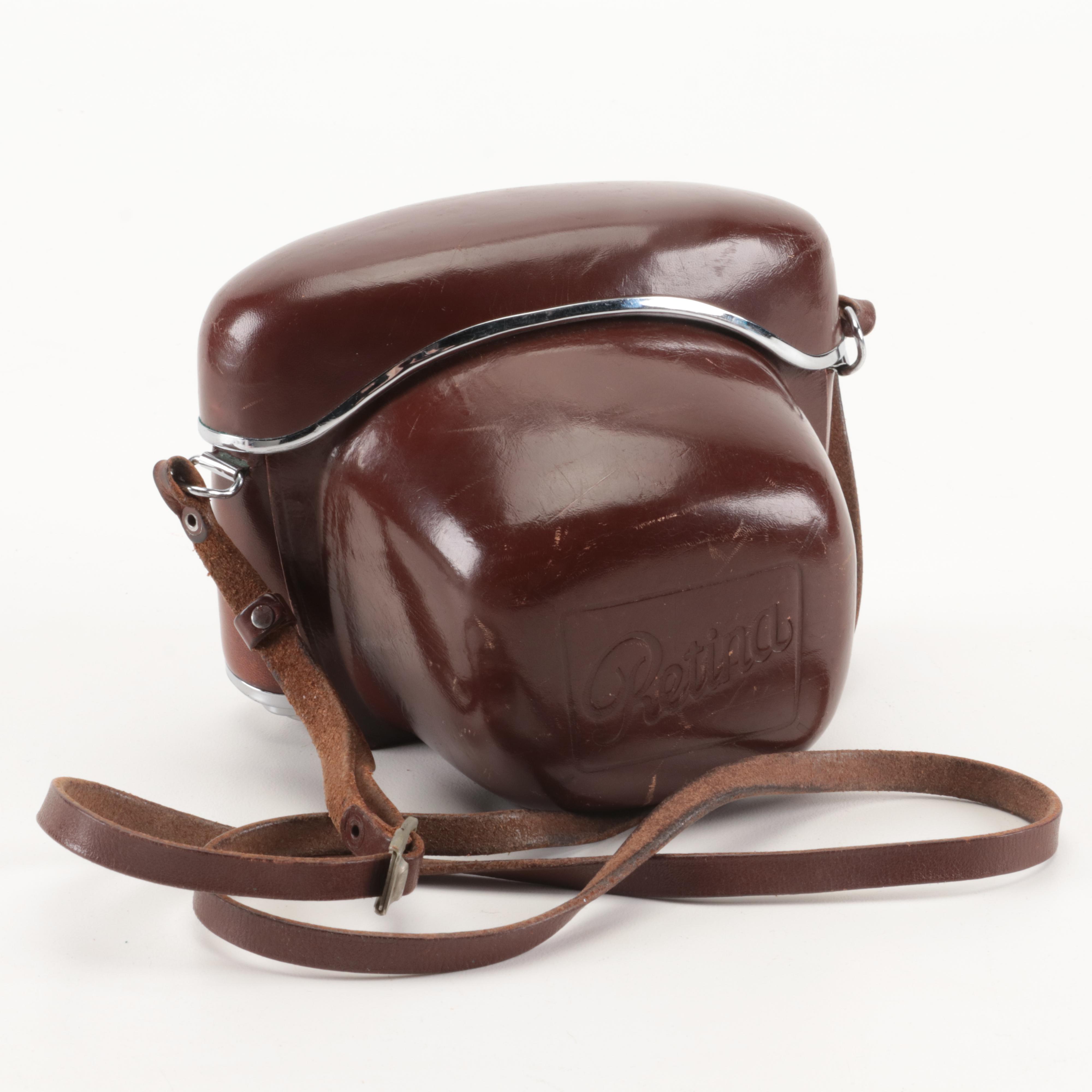 Collection of Kodak Retina Reflex Cameras With Leather Cases