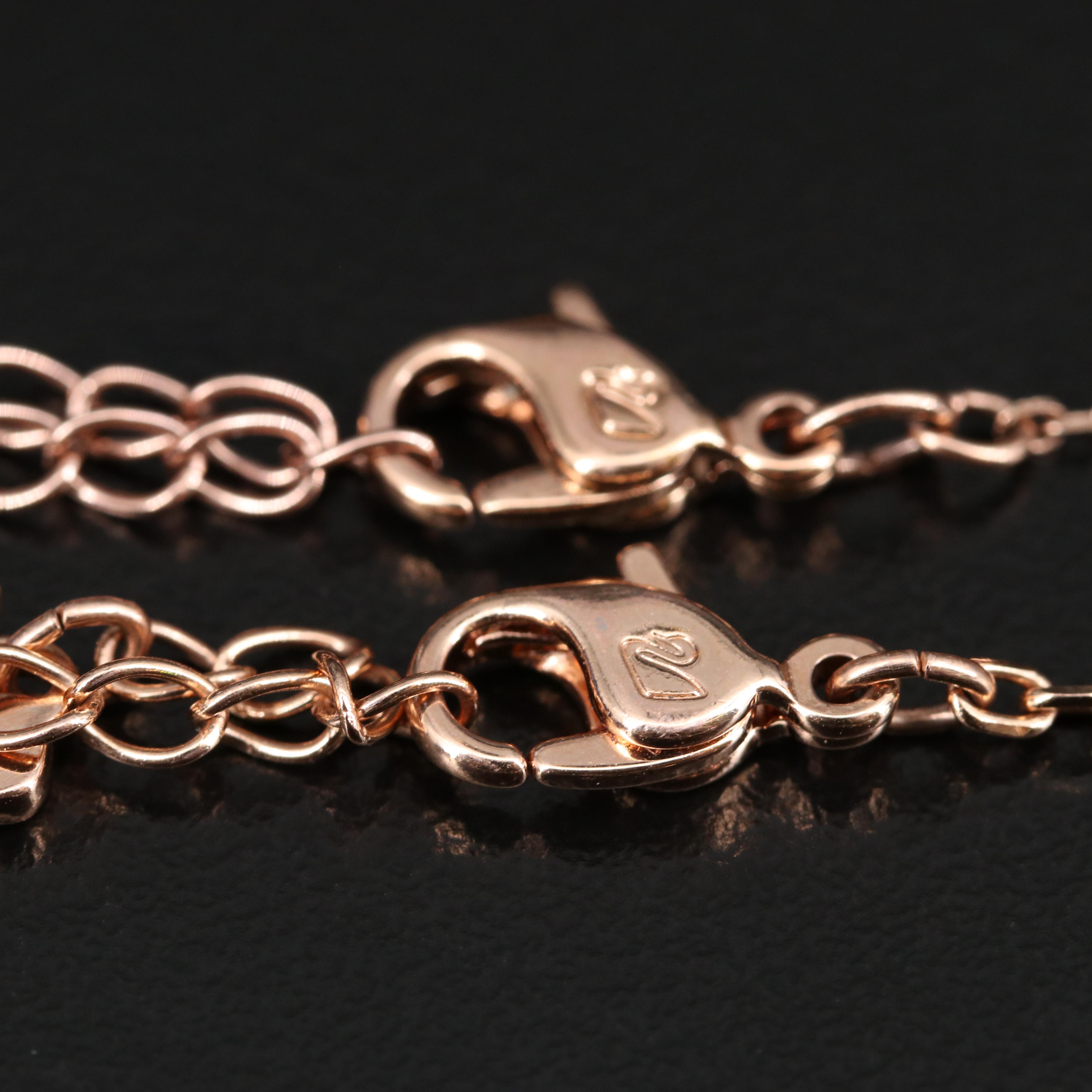 Swarovski Featuring "Globe" and "Funk" Necklaces