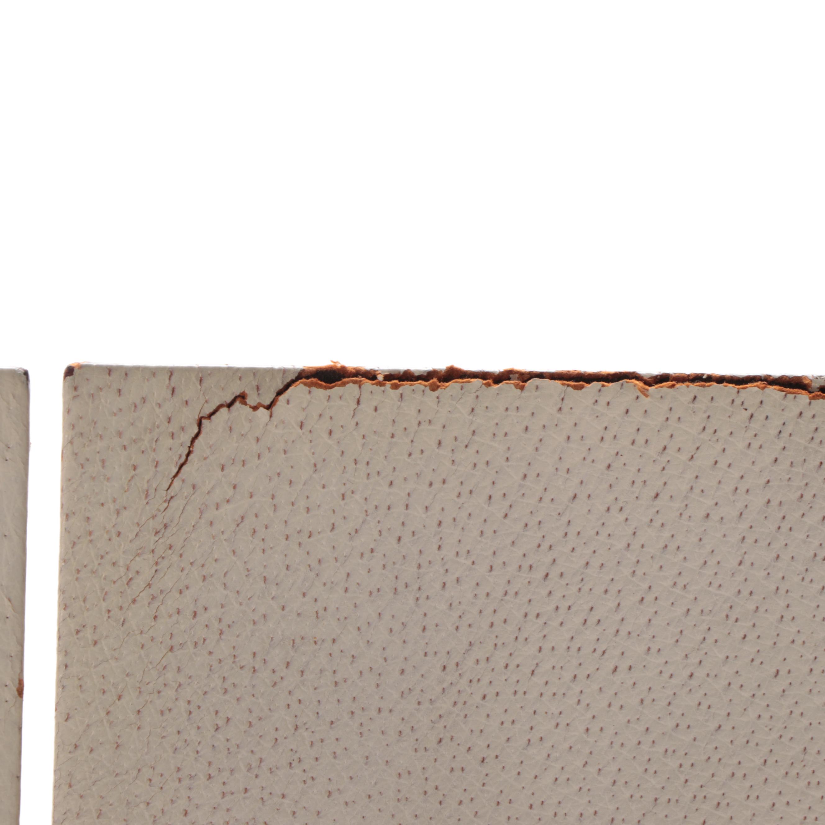 Pair of Ditta Raimondi di Pettinaroli Leather and Gilt Metal Arrow Bookends