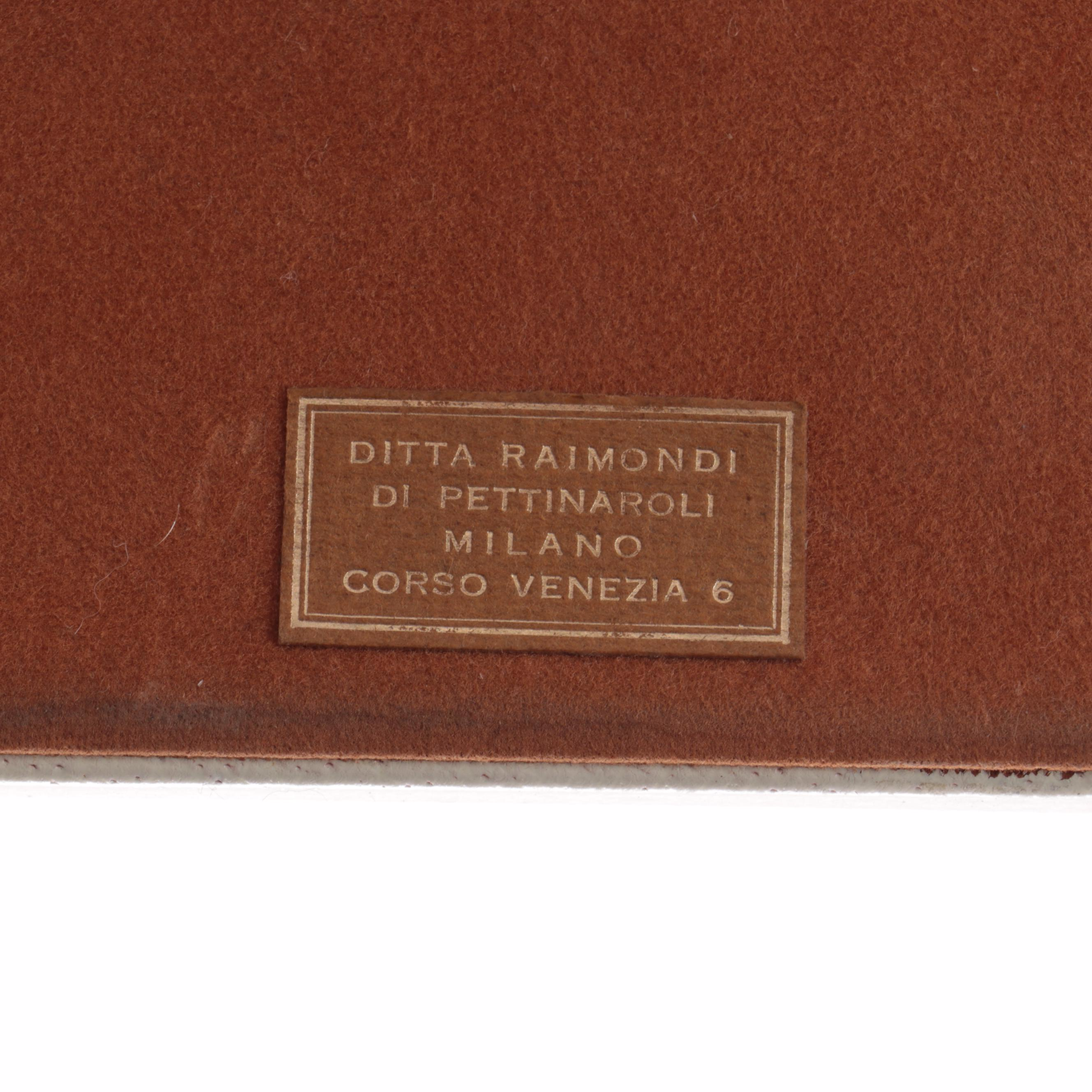 Pair of Ditta Raimondi di Pettinaroli Leather and Gilt Metal Arrow Bookends