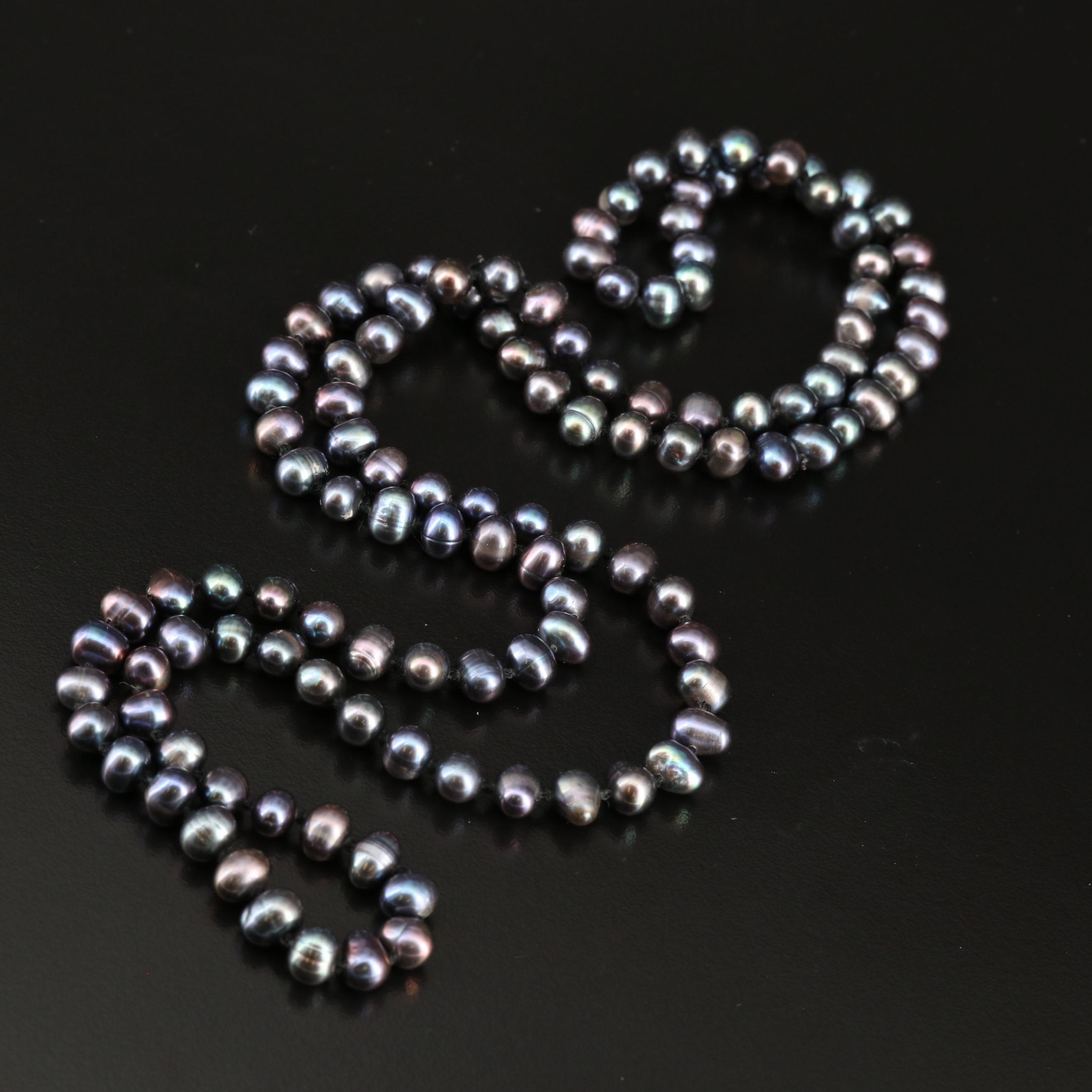 Endless Knotted Pearl Necklaces