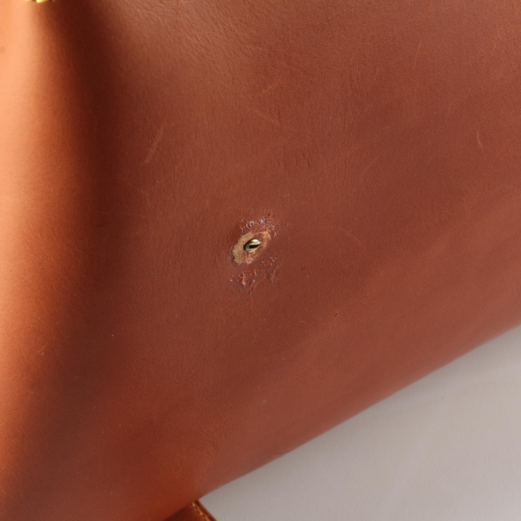 Louis Vuitton Nubie Weekender Bag in Contrast Stitched Brown Nomade Leather