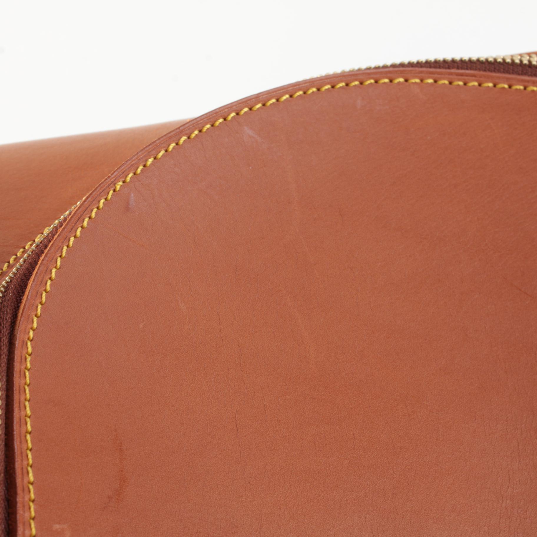 Louis Vuitton Nubie Weekender Bag in Contrast Stitched Brown Nomade Leather