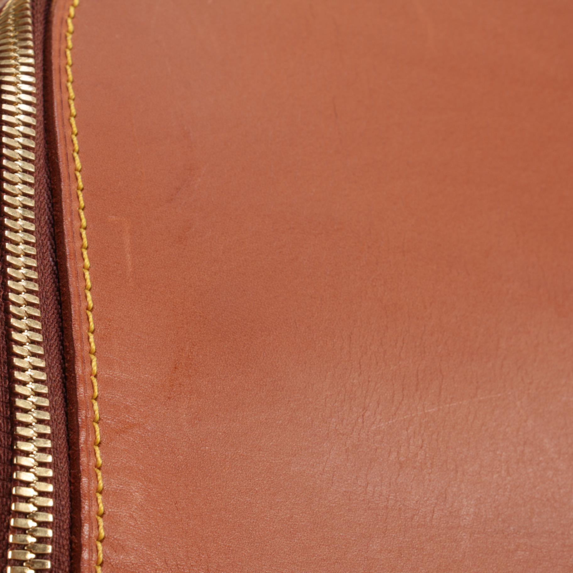 Louis Vuitton Nubie Weekender Bag in Contrast Stitched Brown Nomade Leather