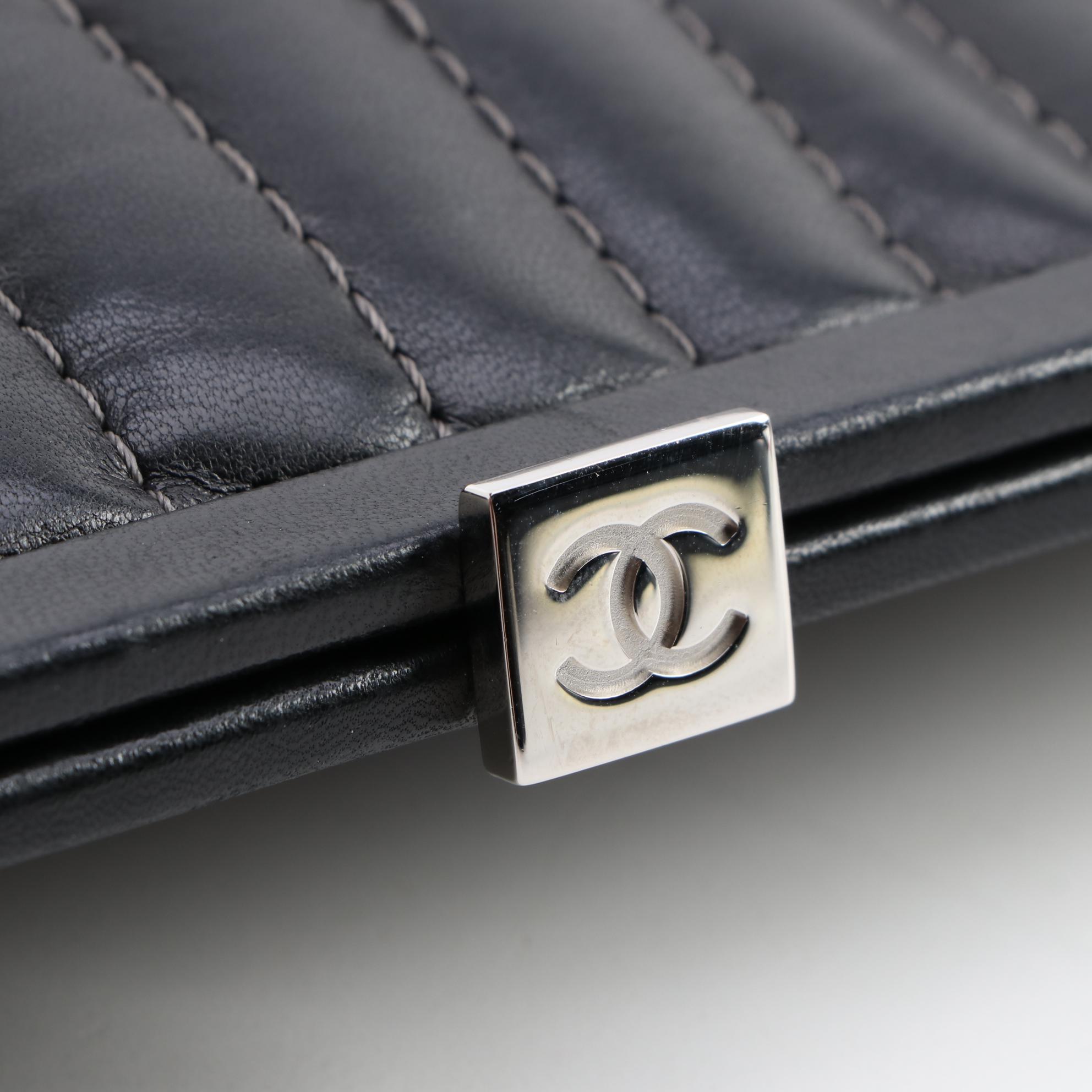 Chanel Mademoiselle Vertical Quilted Black Lambskin Clutch