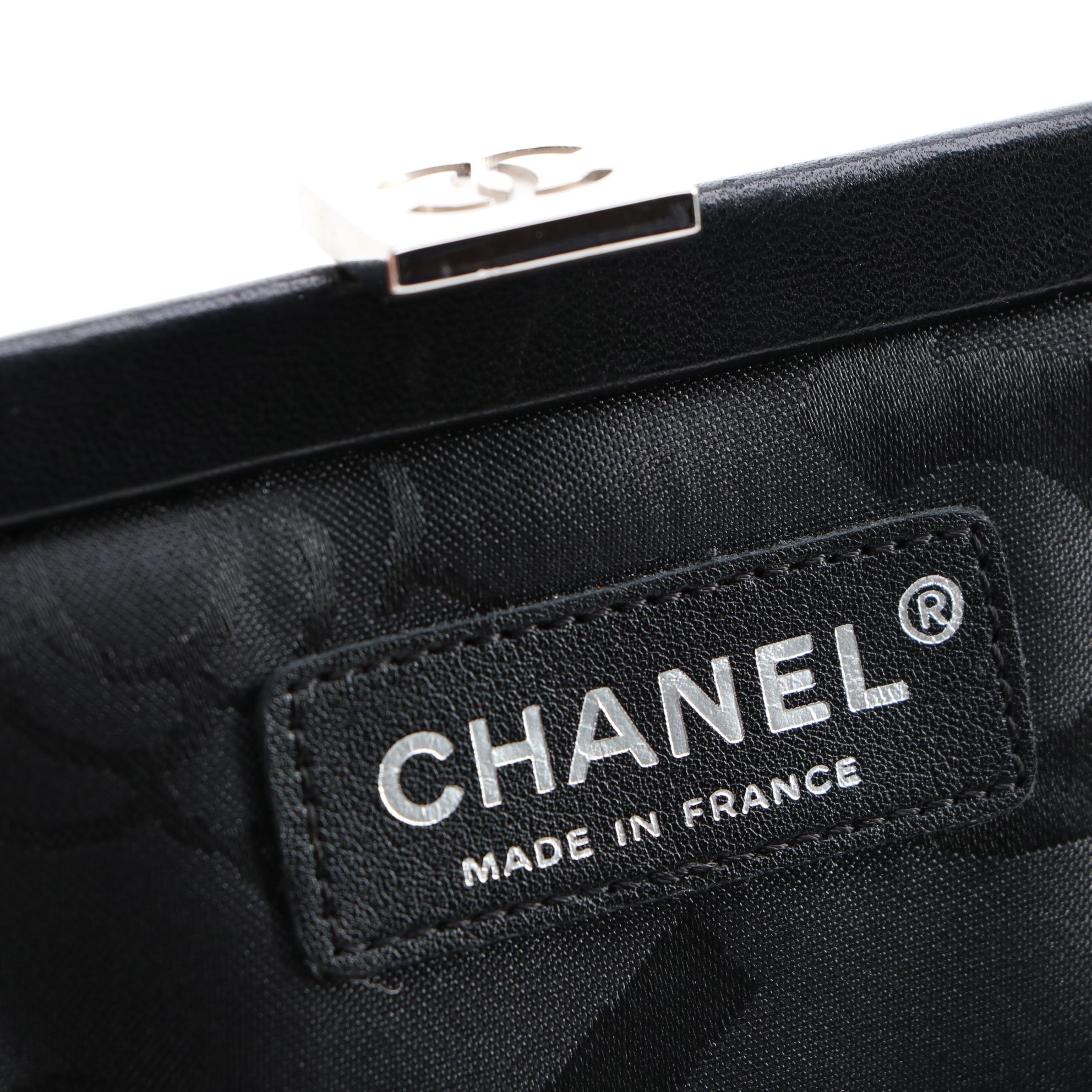 Chanel Mademoiselle Vertical Quilted Black Lambskin Clutch