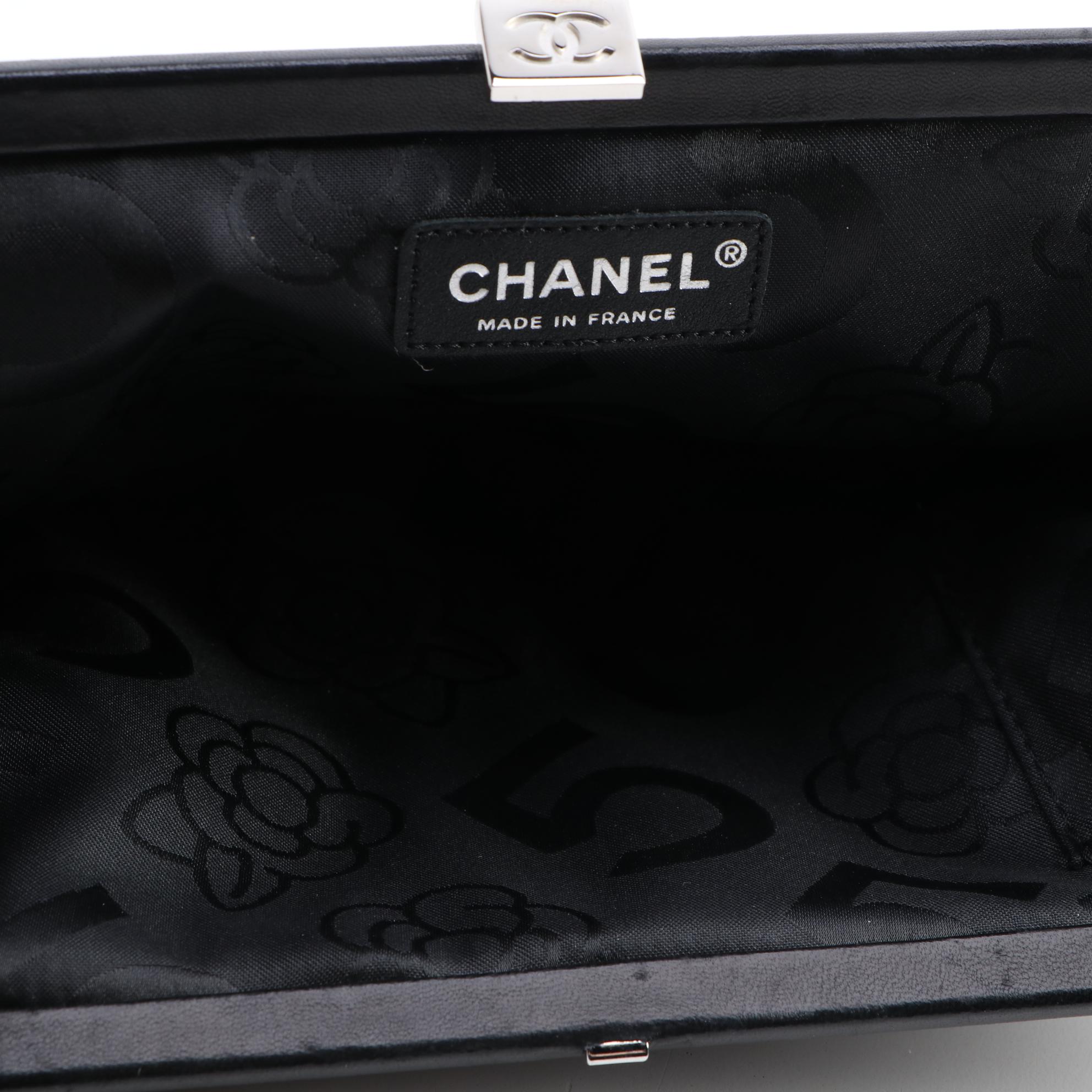 Chanel Mademoiselle Vertical Quilted Black Lambskin Clutch