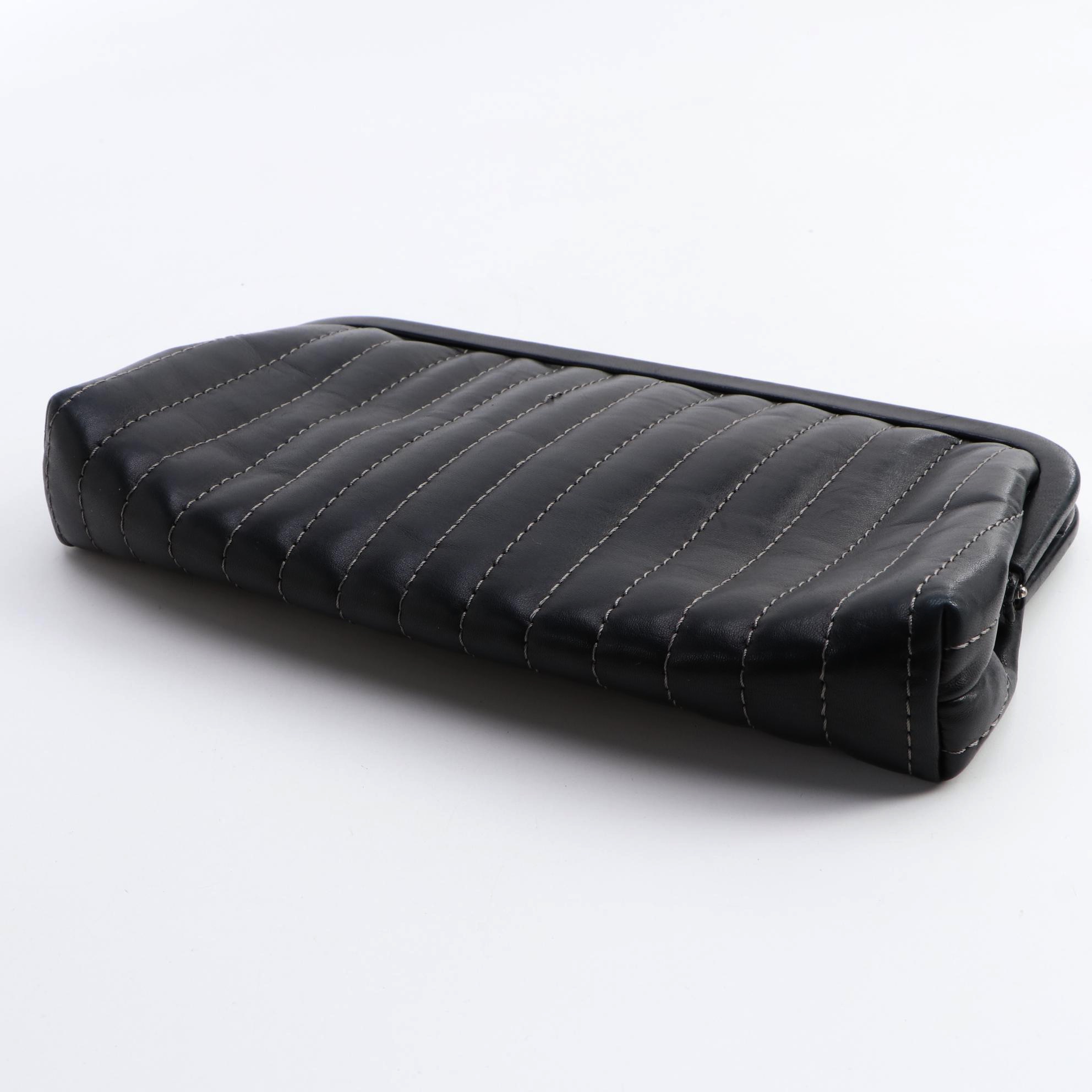 Chanel Mademoiselle Vertical Quilted Black Lambskin Clutch