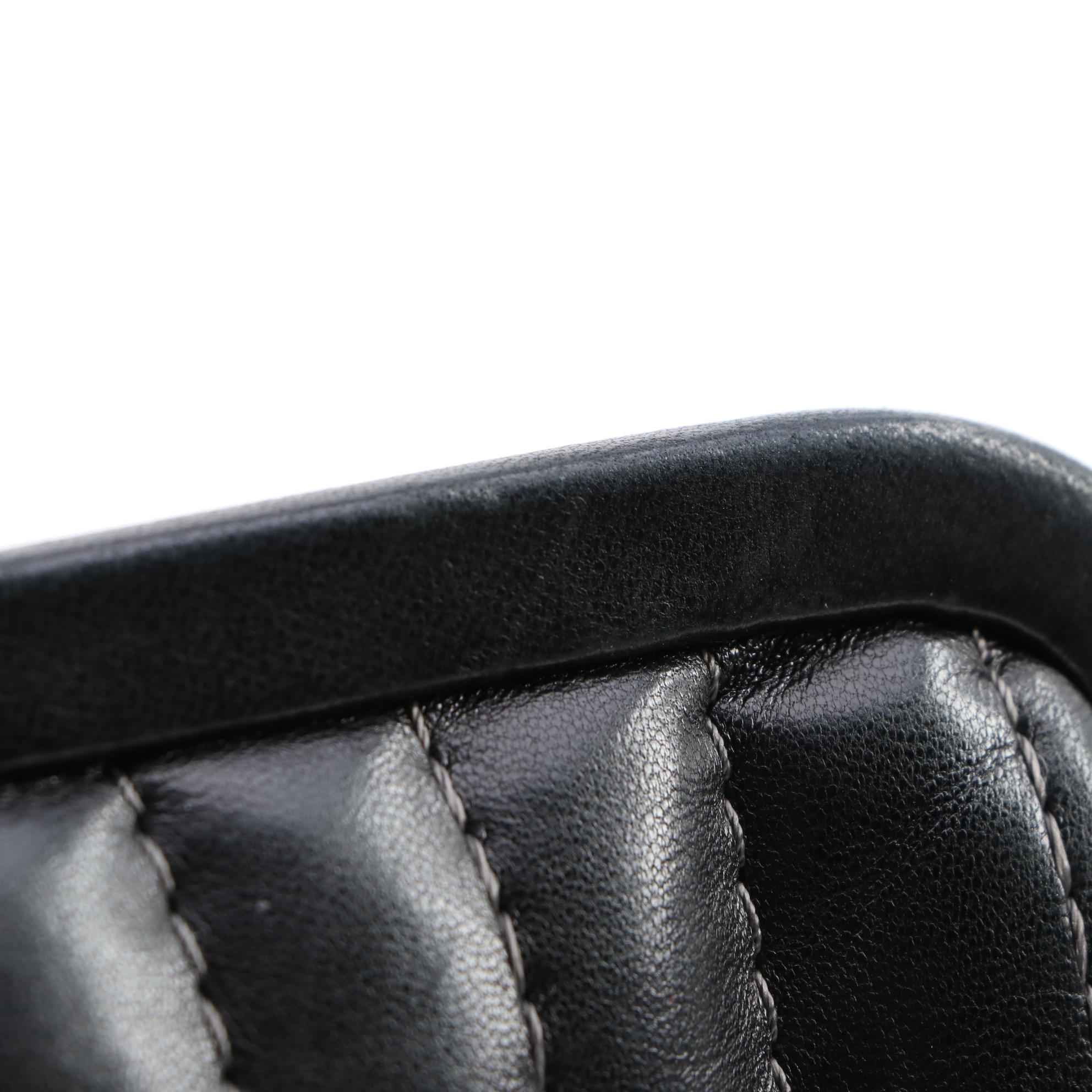 Chanel Mademoiselle Vertical Quilted Black Lambskin Clutch