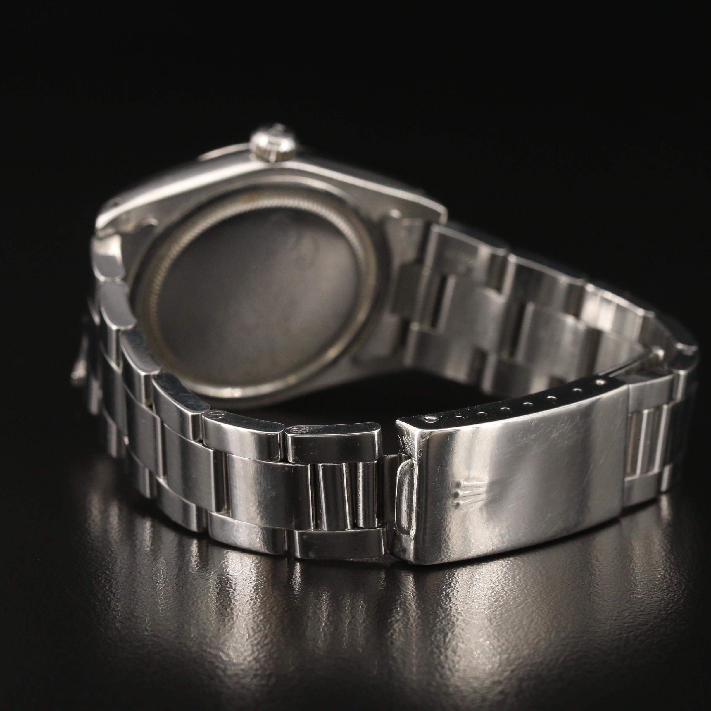 1983 Rolex Oysterdate Stainless Steel Stem Wind Watch