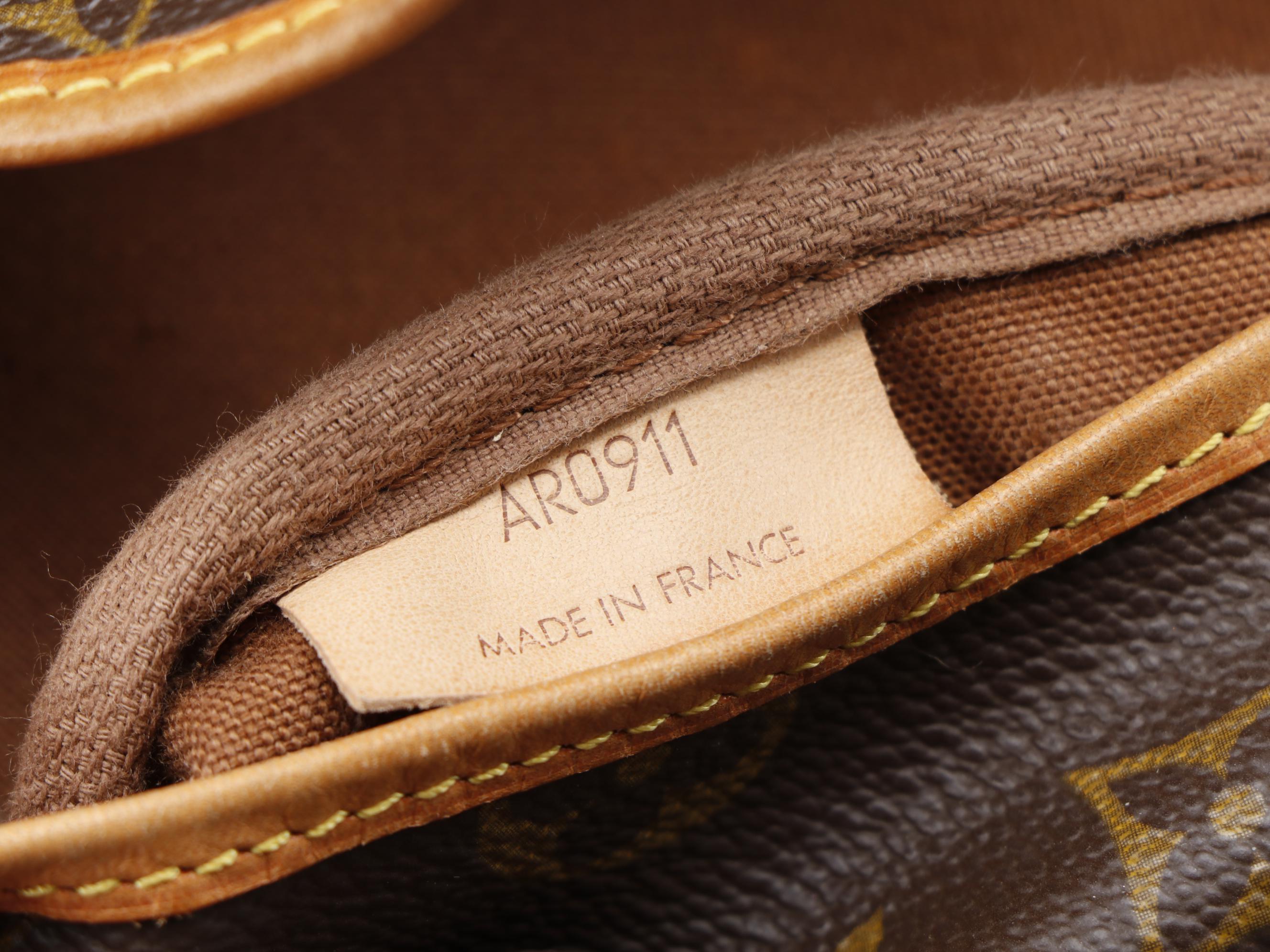 Louis Vuitton Saumur 35 Messenger Bag in Monogram Canvas and Vachetta Leather