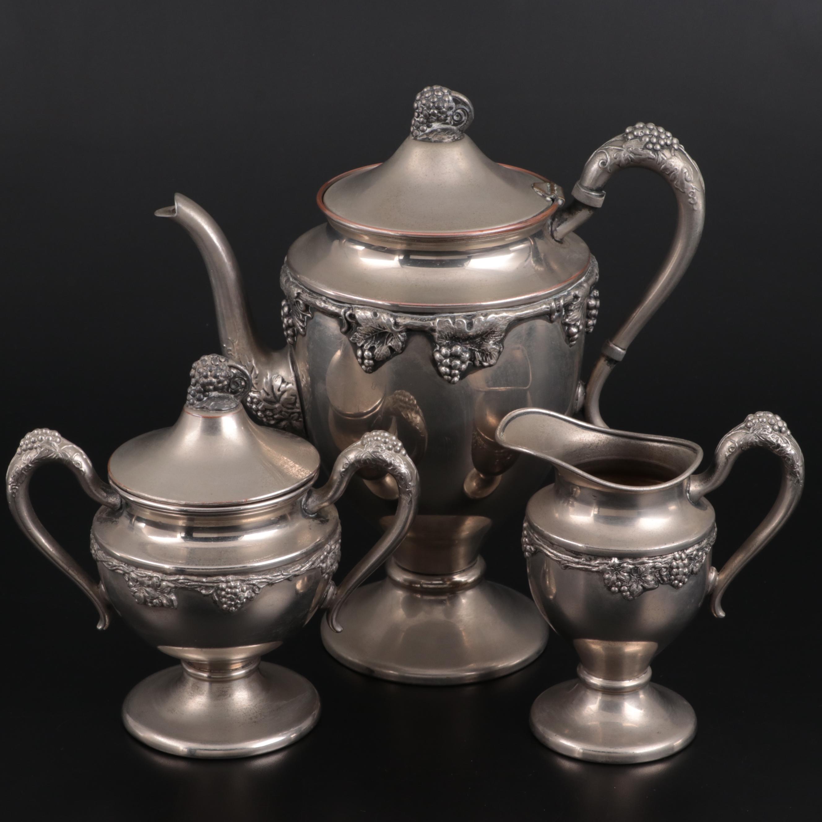 Lehman Brothers Silver Plate Footed Teapot, Creamer, and Sugar, Mid-Late 20th C.