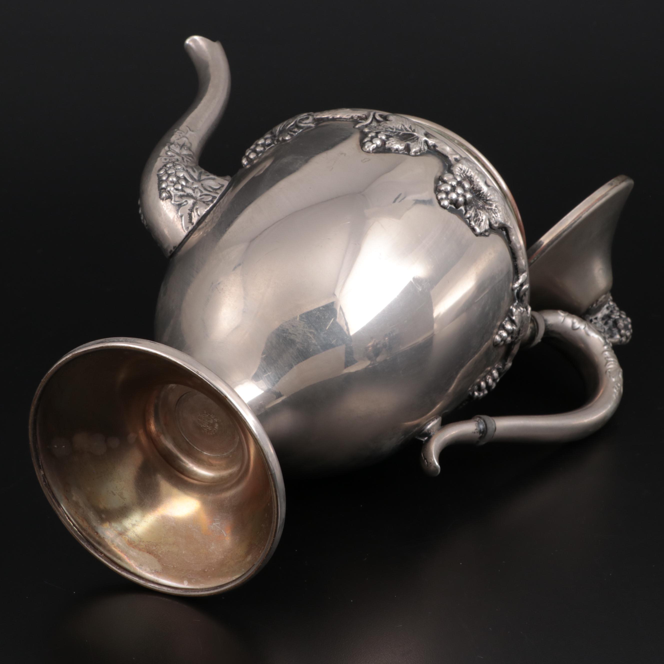 Lehman Brothers Silver Plate Footed Teapot, Creamer, and Sugar, Mid-Late 20th C.