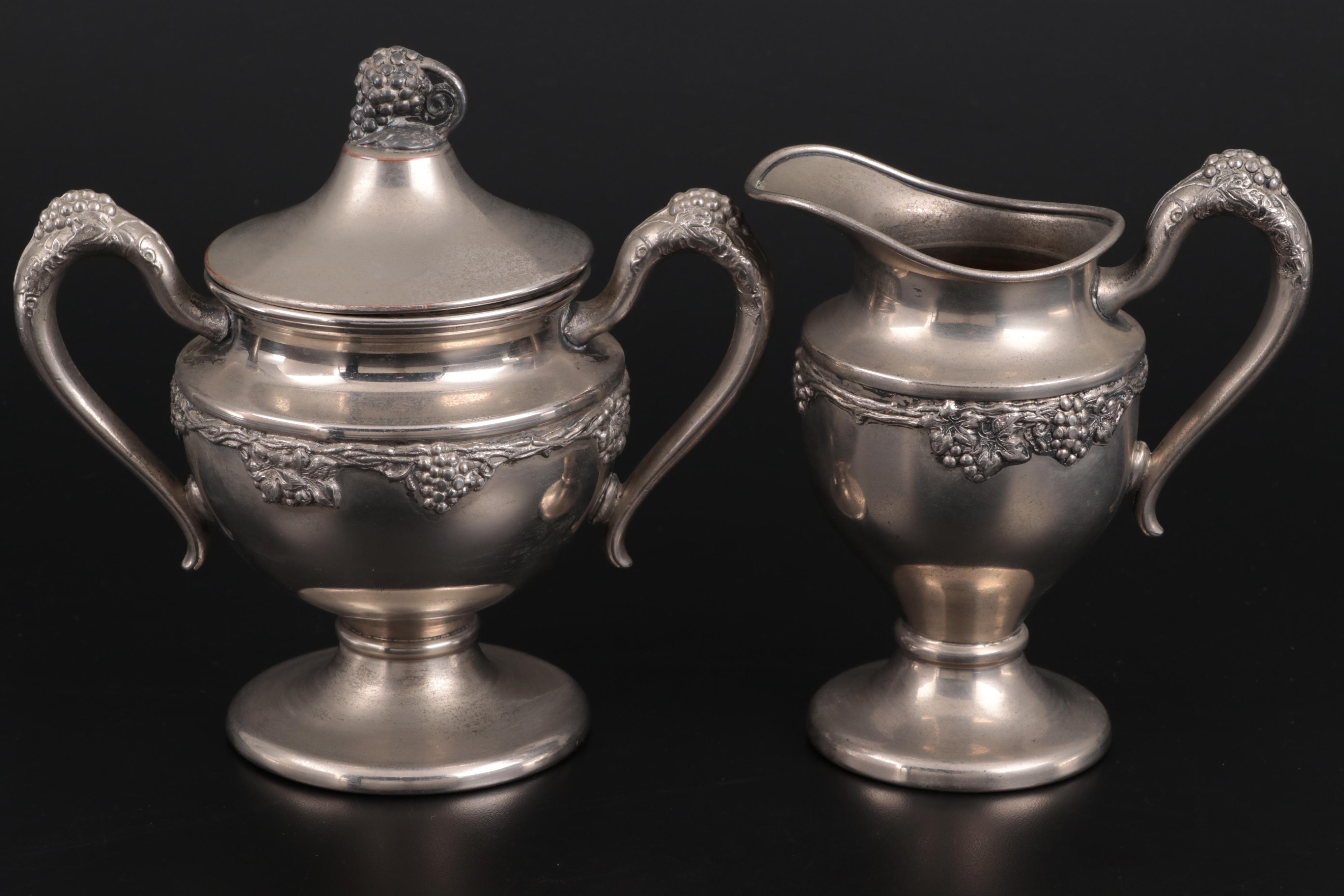 Lehman Brothers Silver Plate Footed Teapot, Creamer, and Sugar, Mid-Late 20th C.