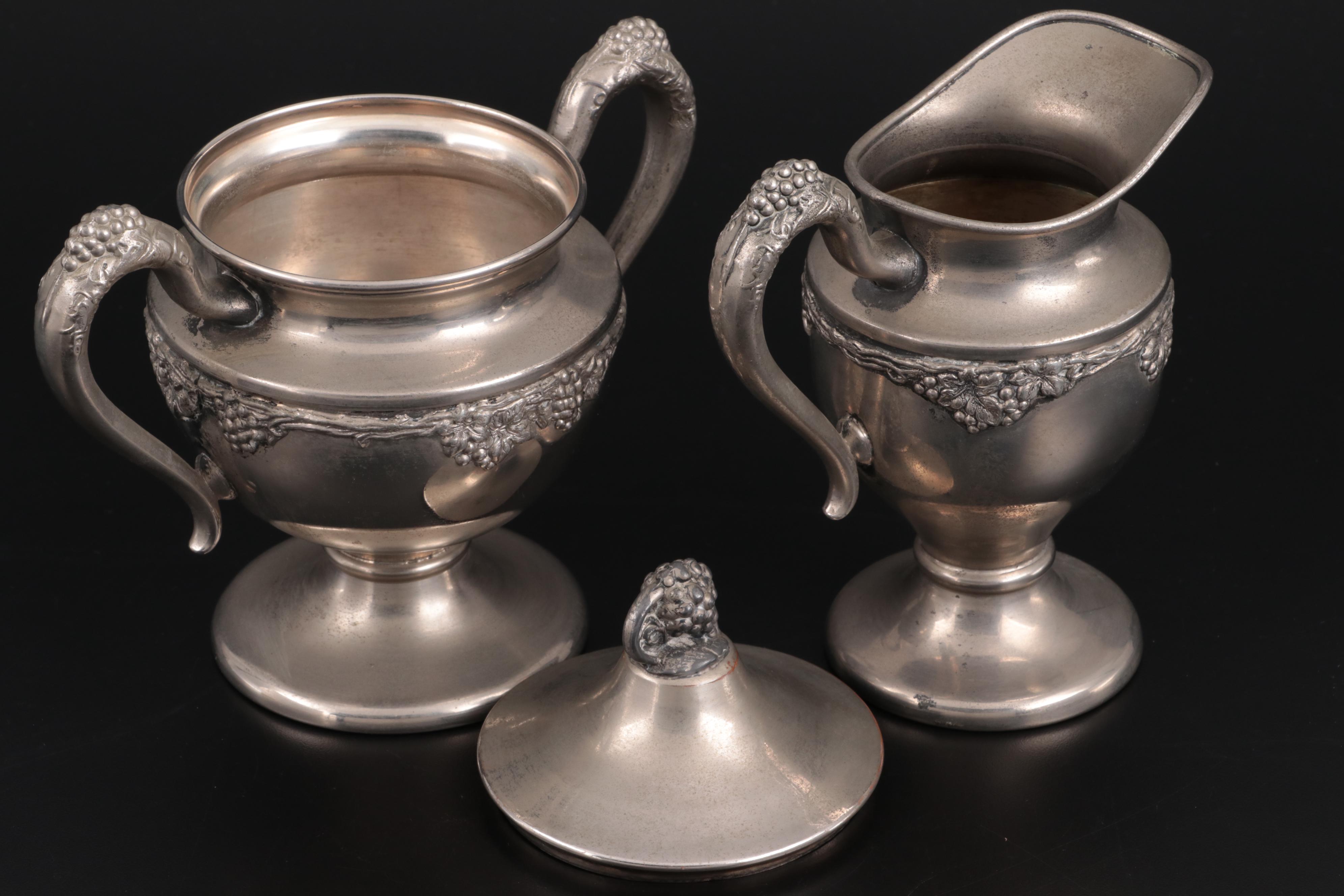 Lehman Brothers Silver Plate Footed Teapot, Creamer, and Sugar, Mid-Late 20th C.