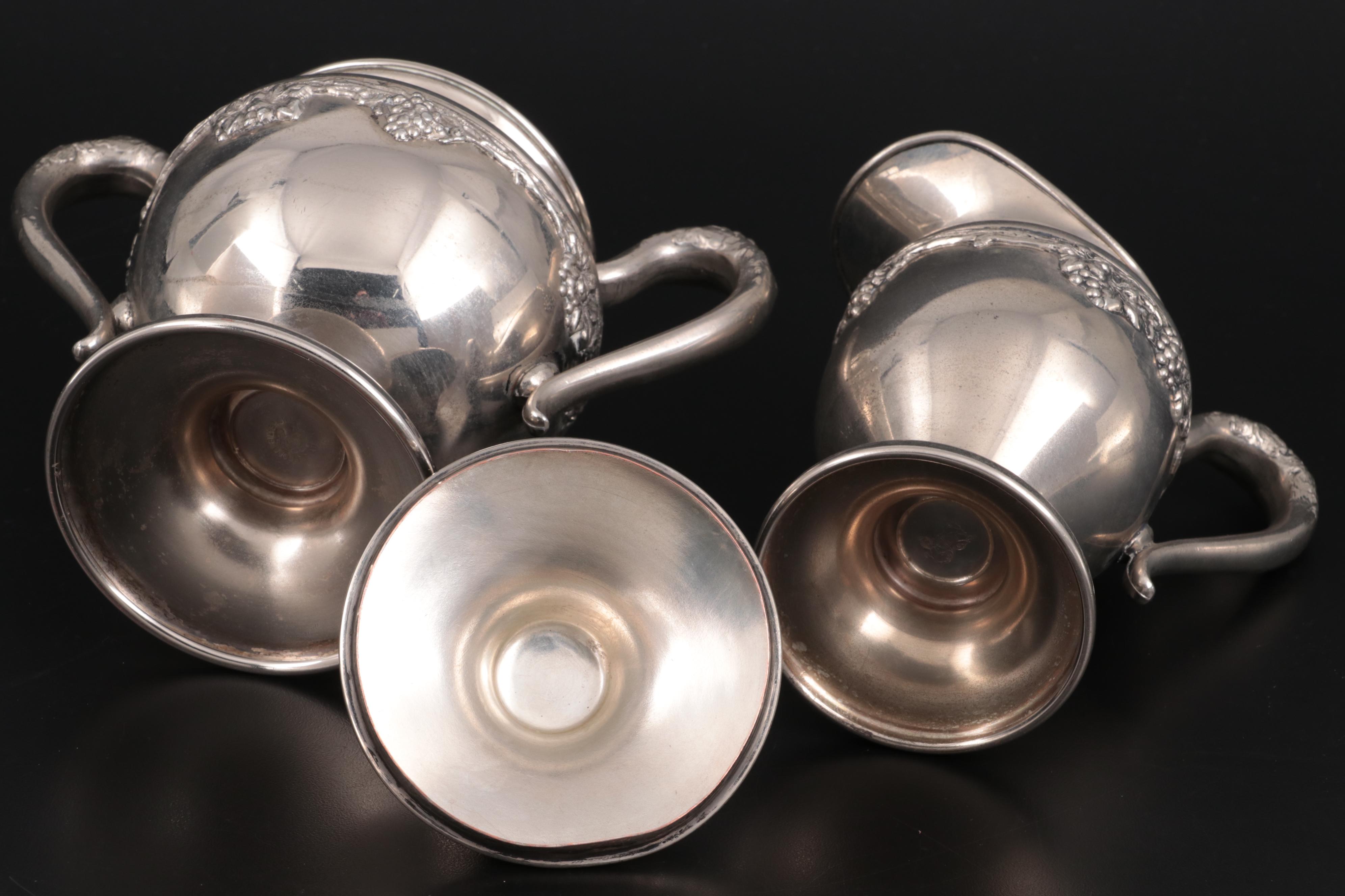 Lehman Brothers Silver Plate Footed Teapot, Creamer, and Sugar, Mid-Late 20th C.
