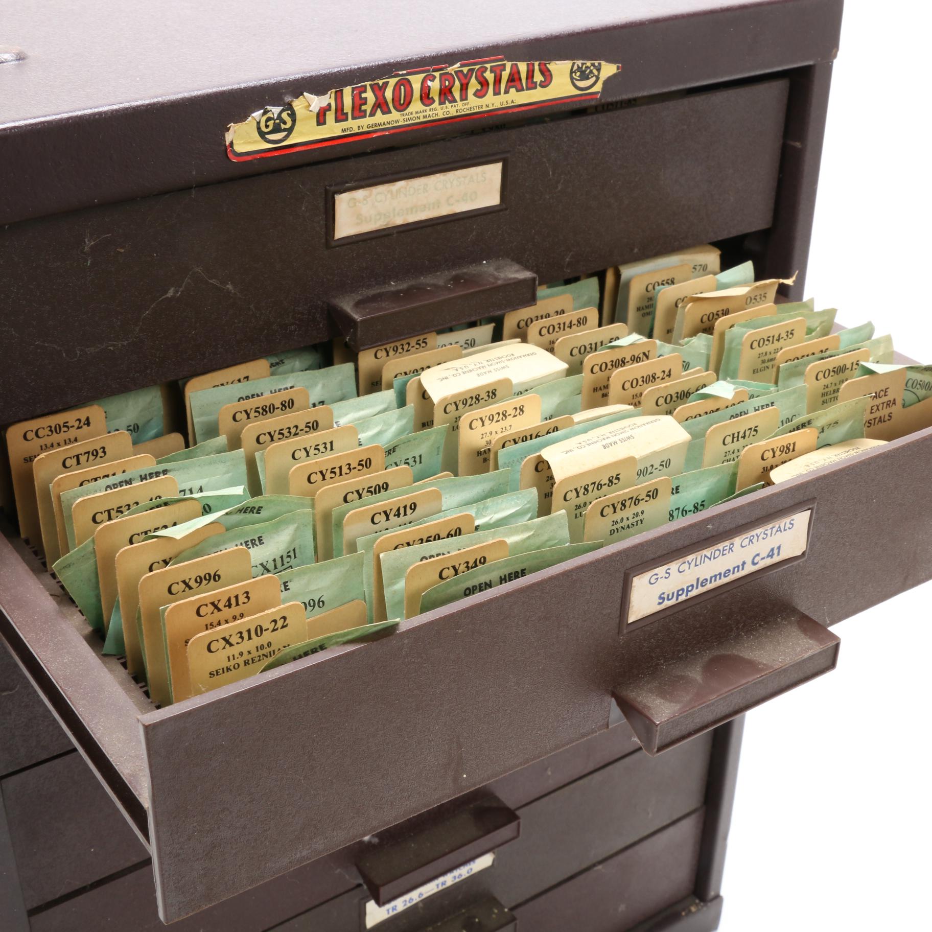 G-S Flexo Crystals Metal Cabinet of Spare Watch Parts