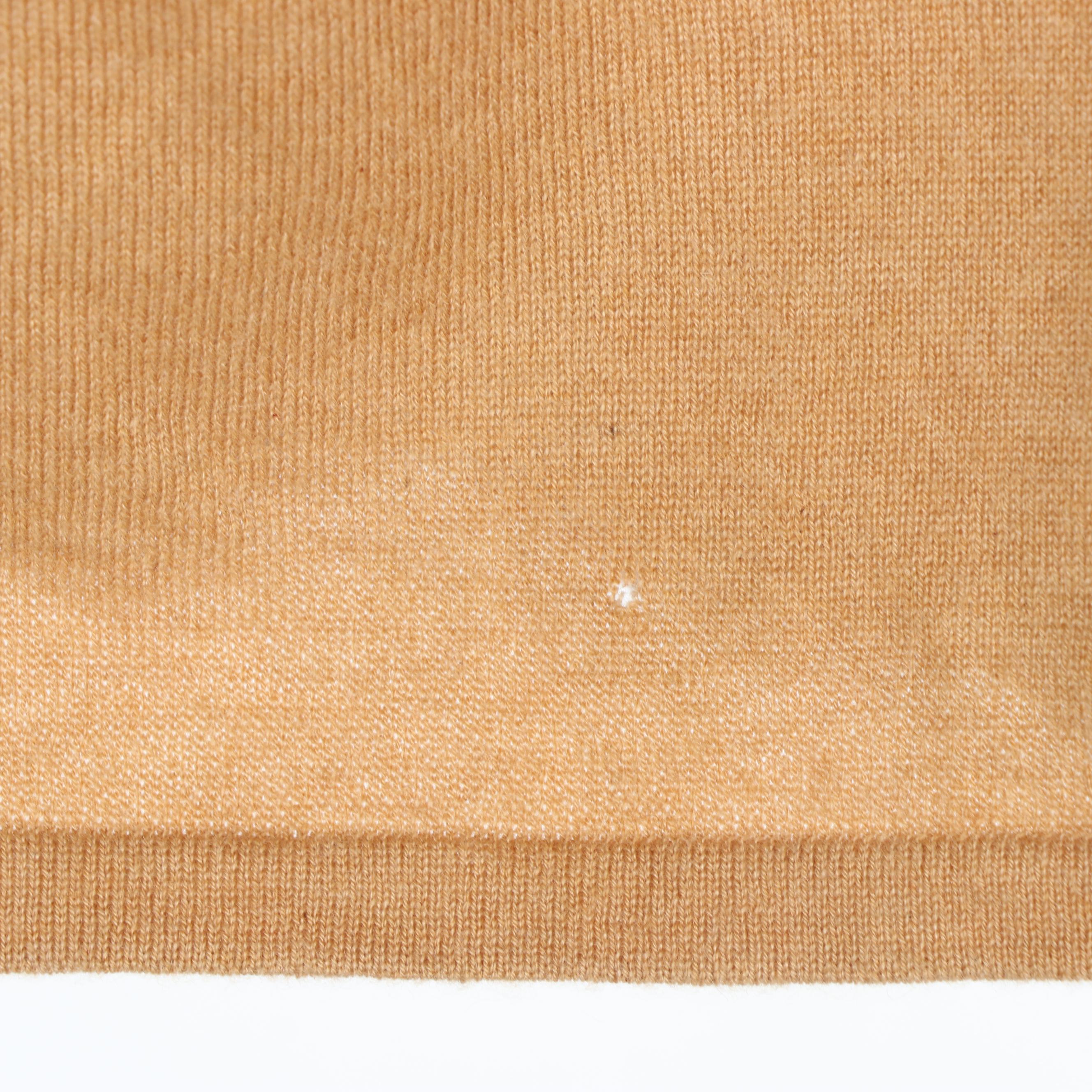 Escada and Roberto Cavalli Embellished Cashmere Sweater and Jeans