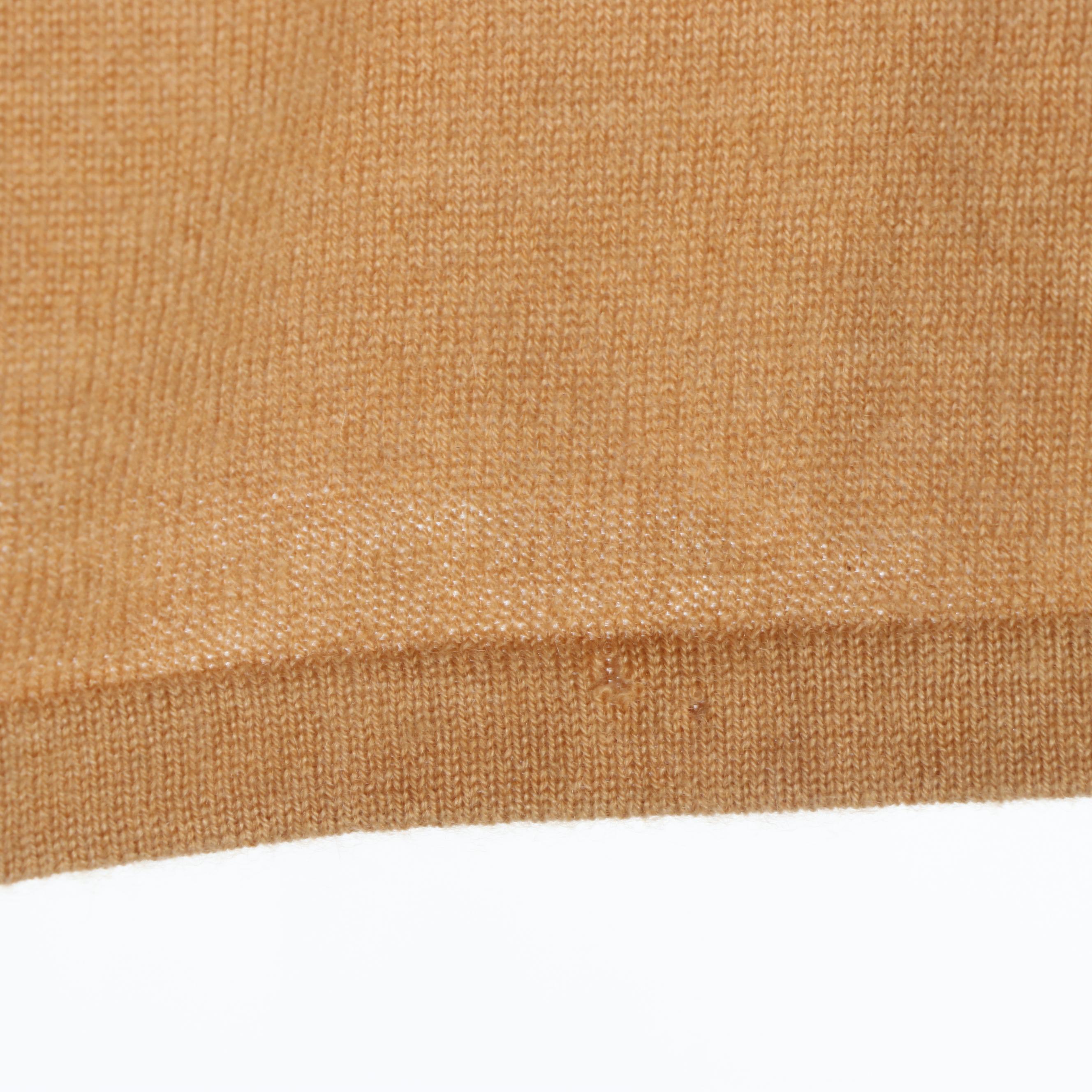 Escada and Roberto Cavalli Embellished Cashmere Sweater and Jeans