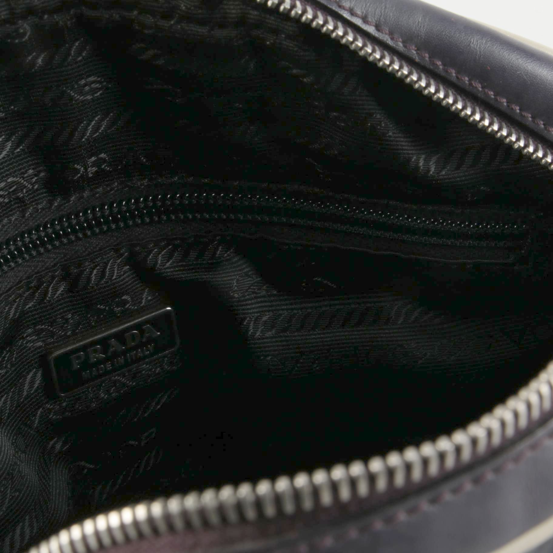 Modified Prada Vitello Drive Perforated Bowler Bag in Dark Aubergine Leather