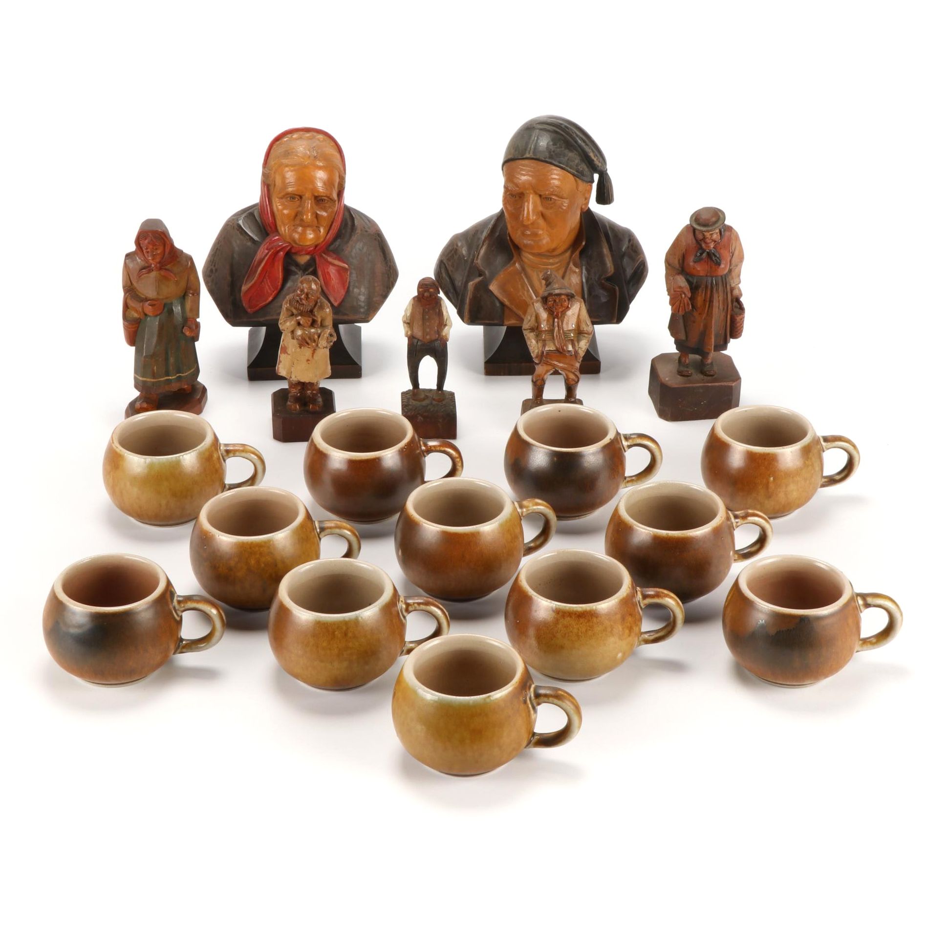 German Reinhold Merkelbach Stoneware Mugs and Hand Carved Wooden Figurines