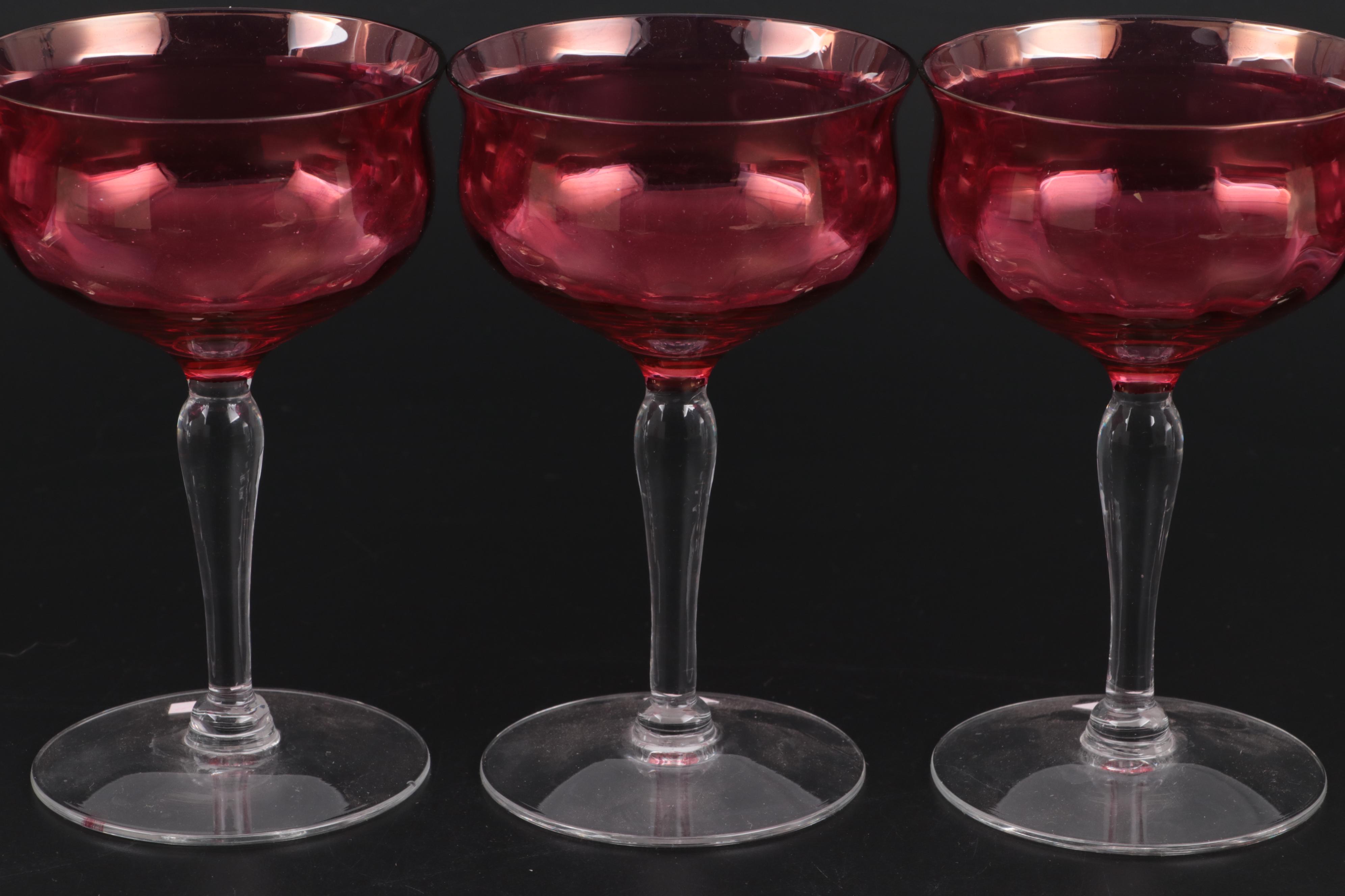 Cranberry Glass Thumbprint Tumblers and Coupes with Pink Depression Glass Plates