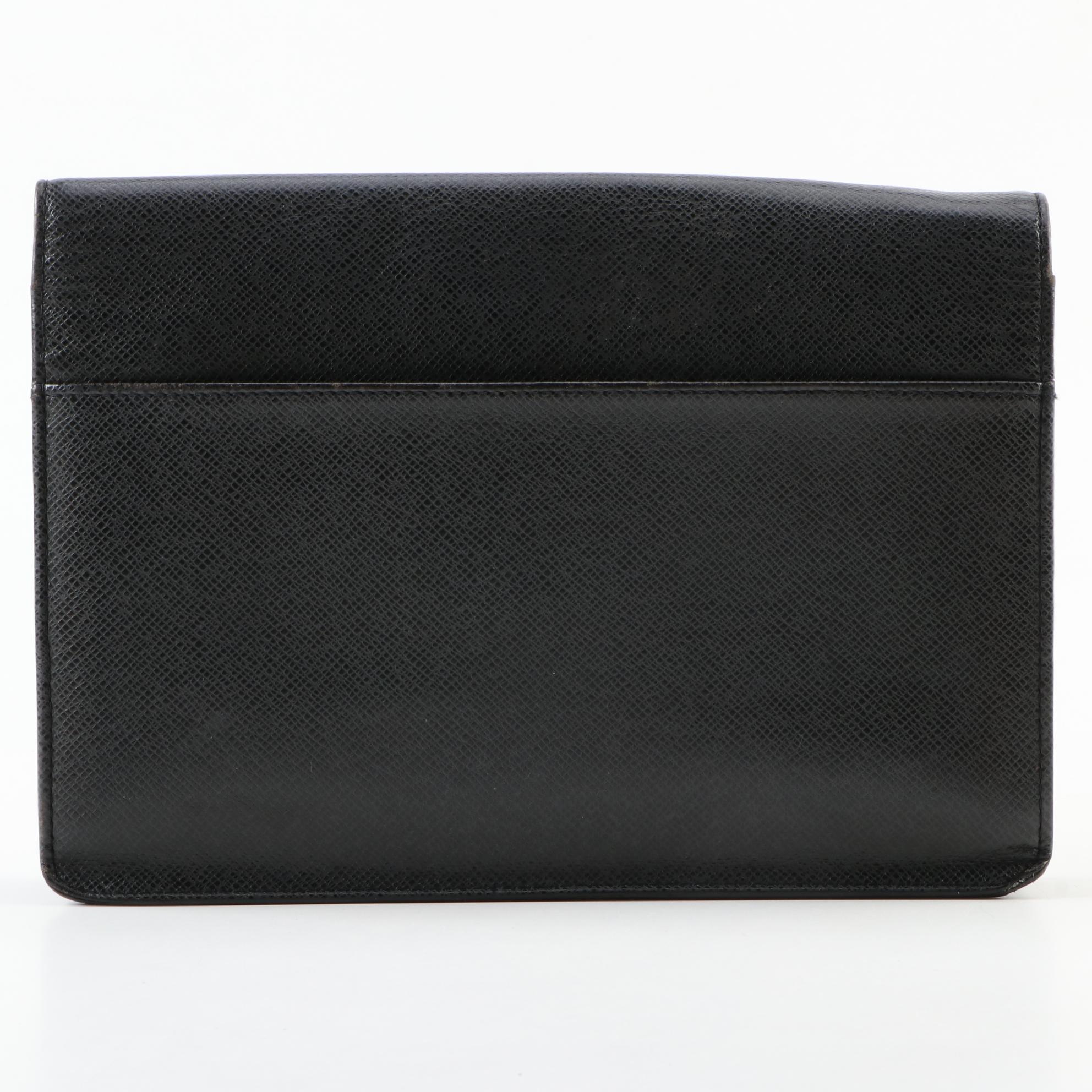 Louis Vuitton Pochette Selenga Clutch Wristlet in Black Taiga Leather