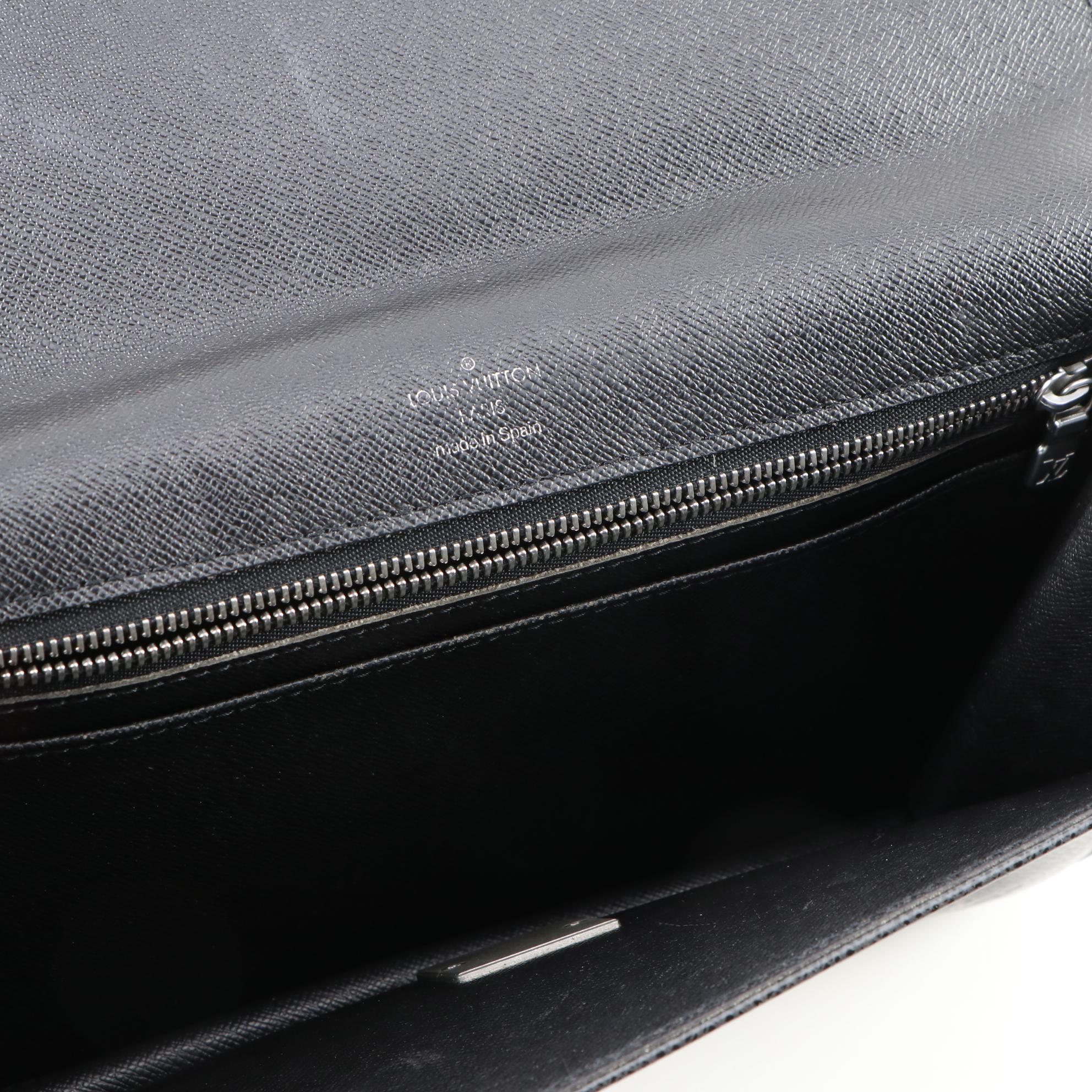 Louis Vuitton Pochette Selenga Clutch Wristlet in Black Taiga Leather