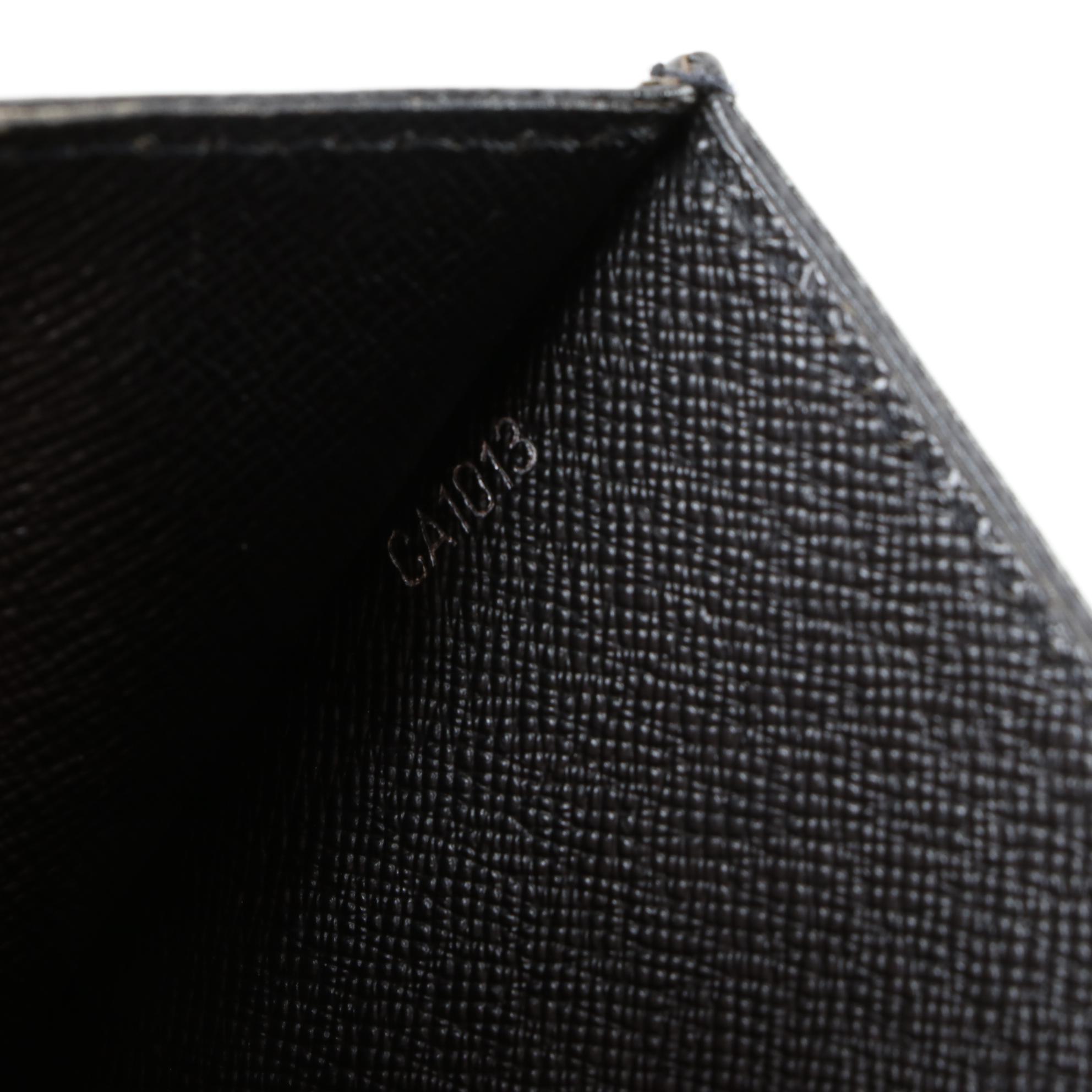 Louis Vuitton Pochette Selenga Clutch Wristlet in Black Taiga Leather