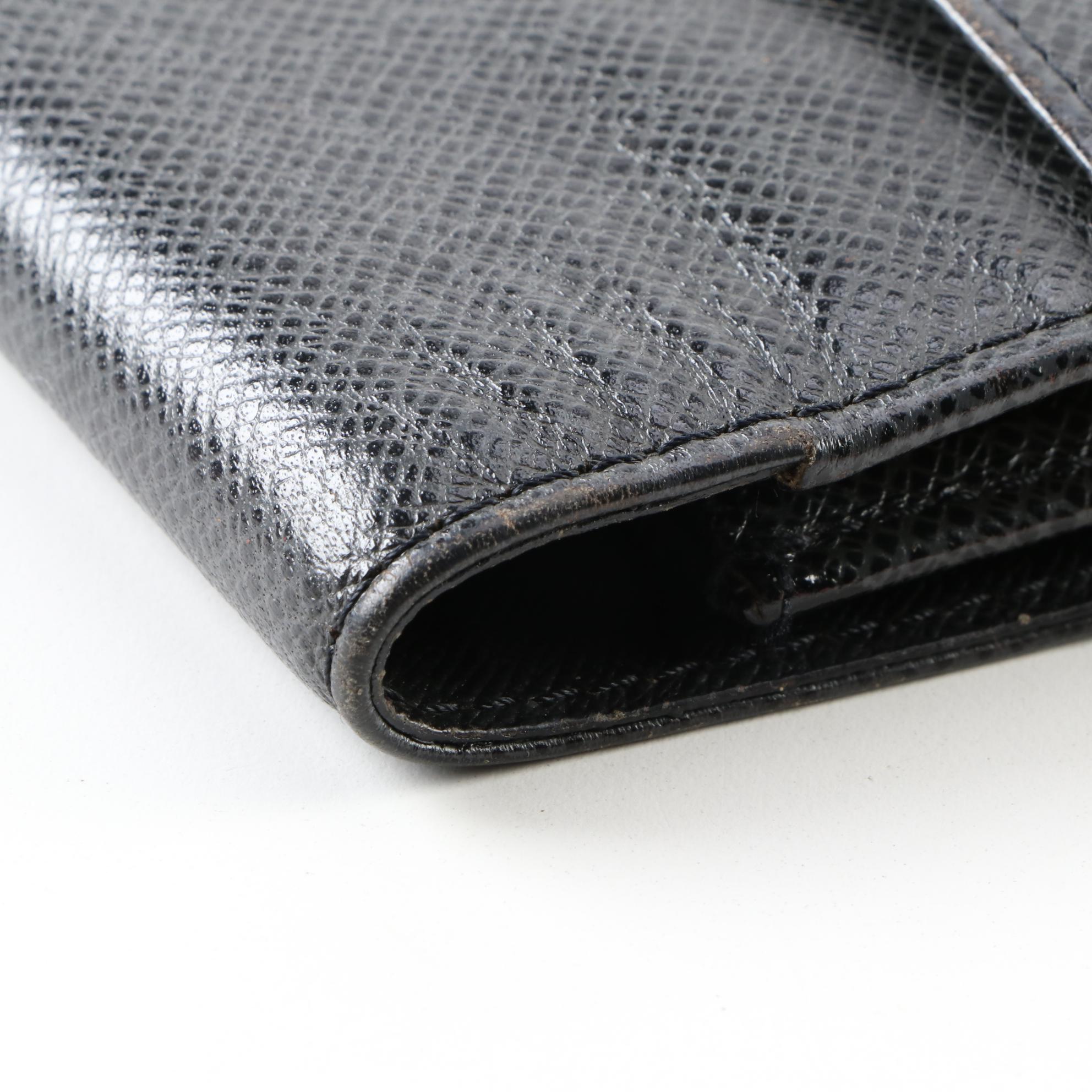 Louis Vuitton Pochette Selenga Clutch Wristlet in Black Taiga Leather