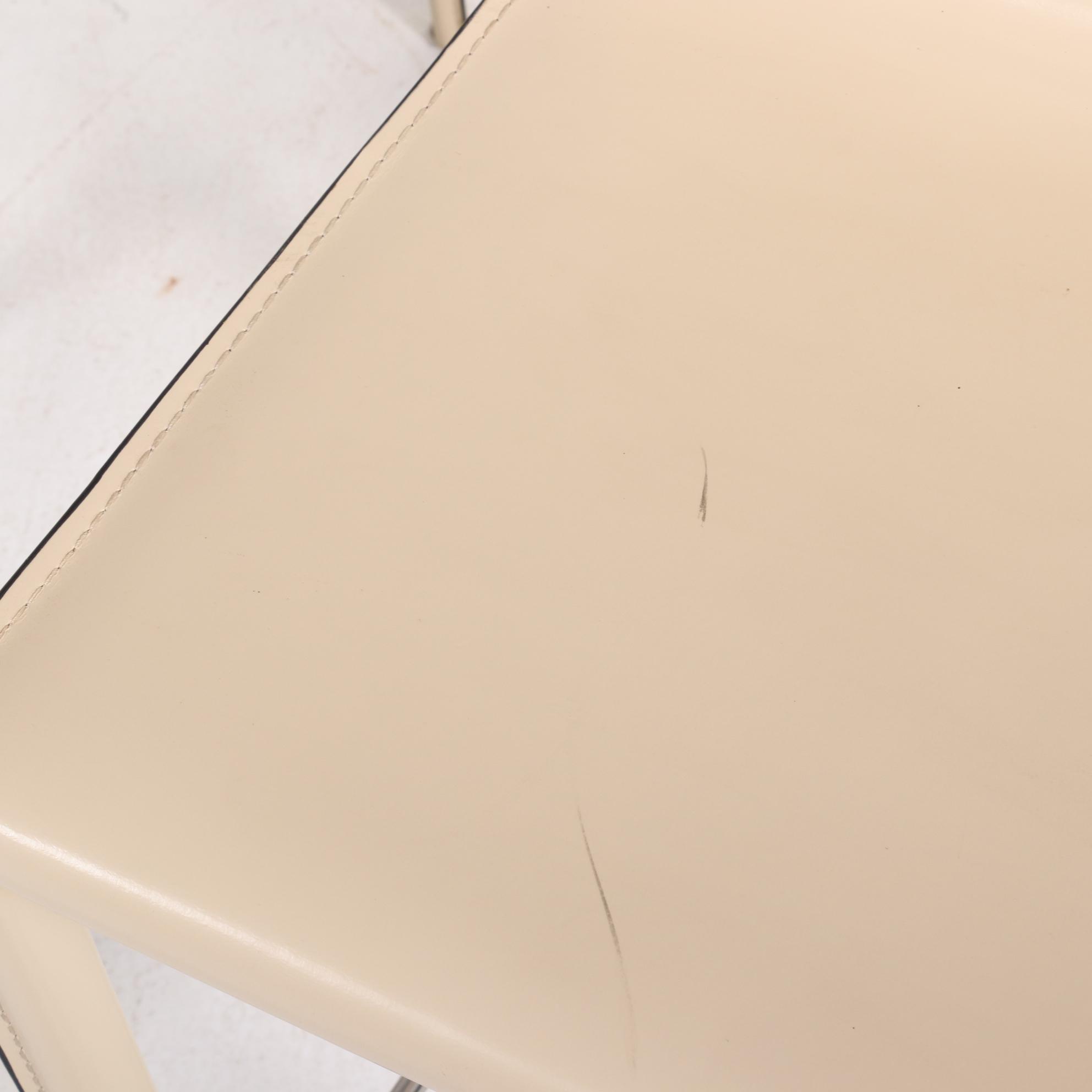 Four Modernist Style Cream Faux Leather Wrapped Counter Stools