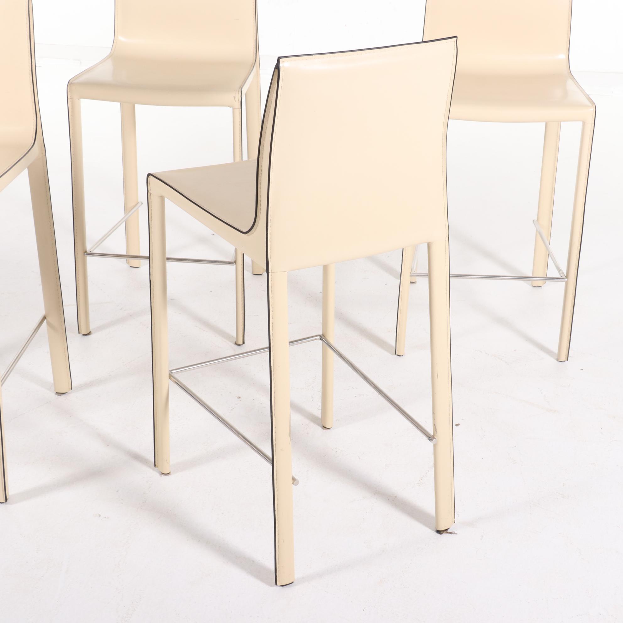 Four Modernist Style Cream Faux Leather Wrapped Counter Stools