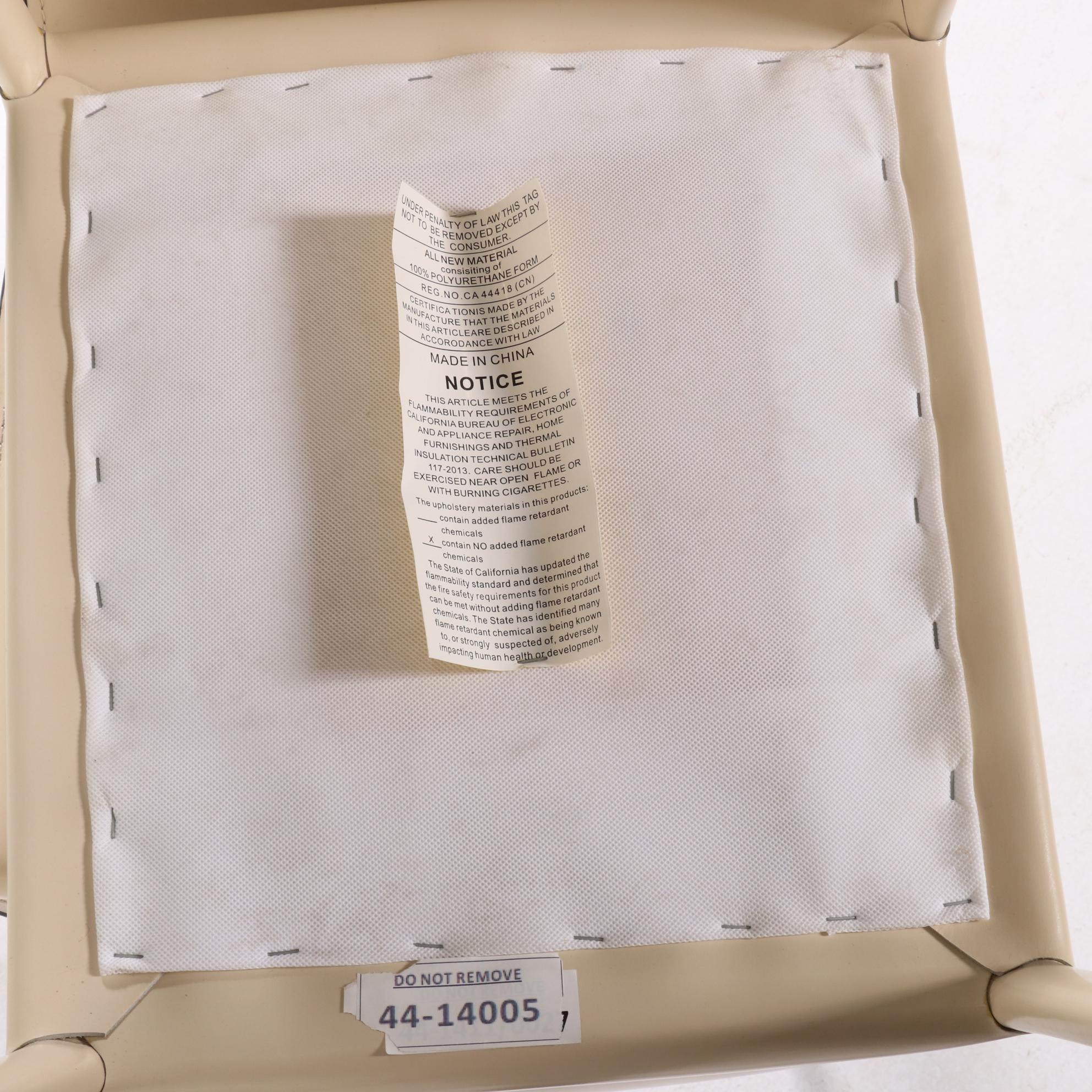 Four Modernist Style Cream Faux Leather Wrapped Counter Stools