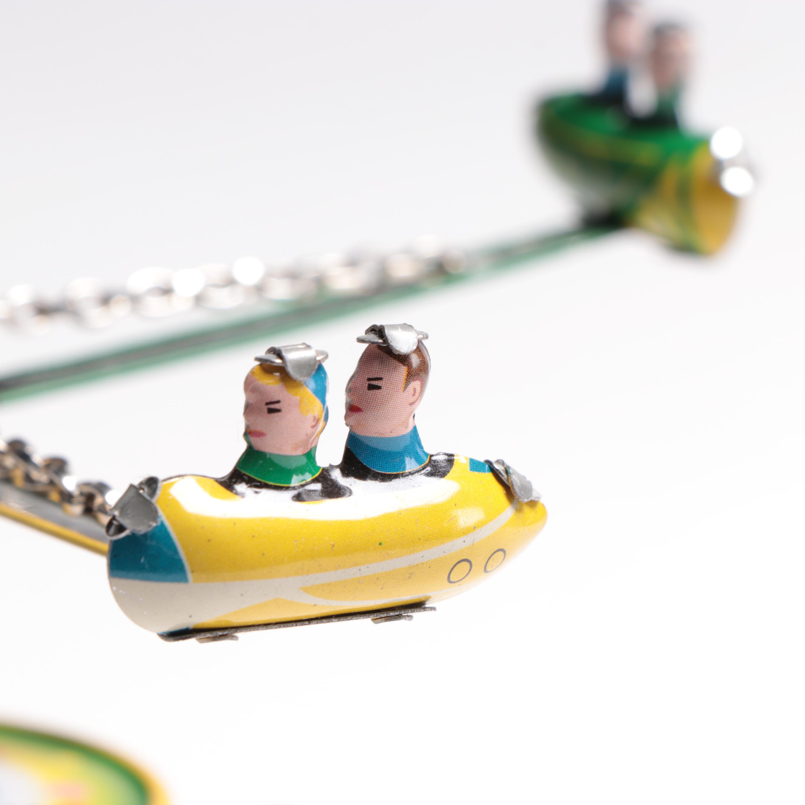 Schylling "Rocket Ride Carousel" and Other Carnival Ride Tin Toys