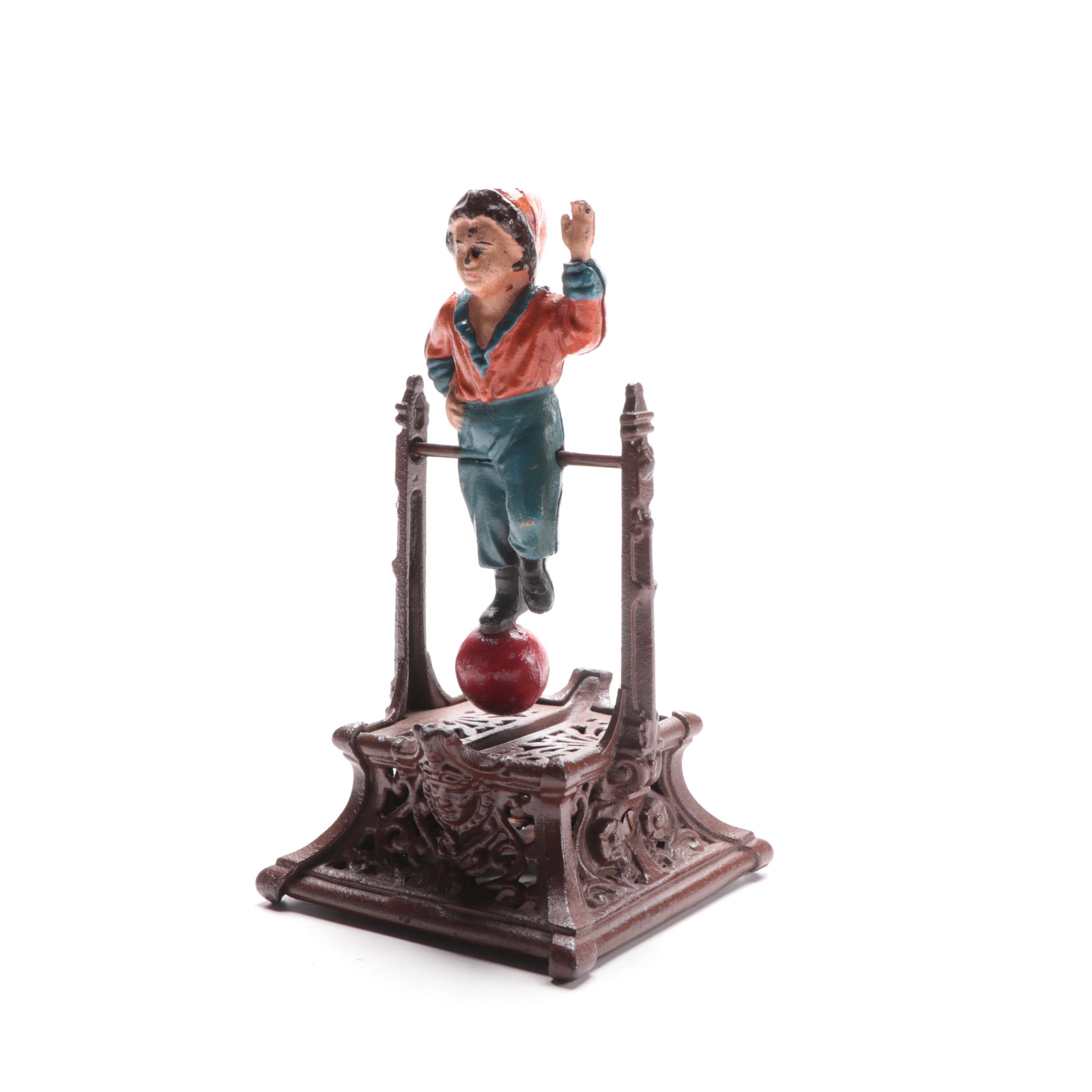 Cast Iron "Boy on Trapeze" Reproduction Bank, Late 20th Century