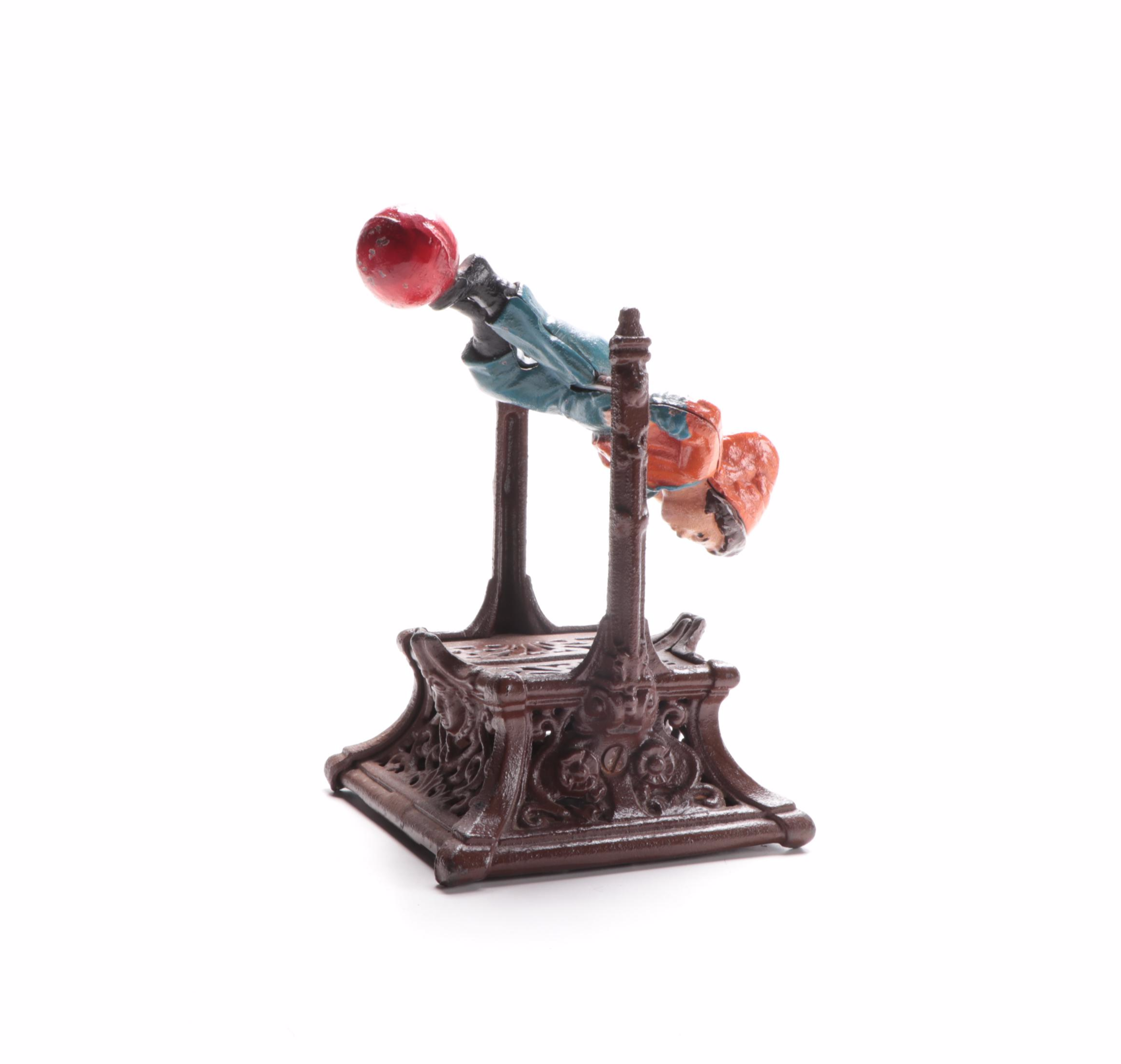 Cast Iron "Boy on Trapeze" Reproduction Bank, Late 20th Century