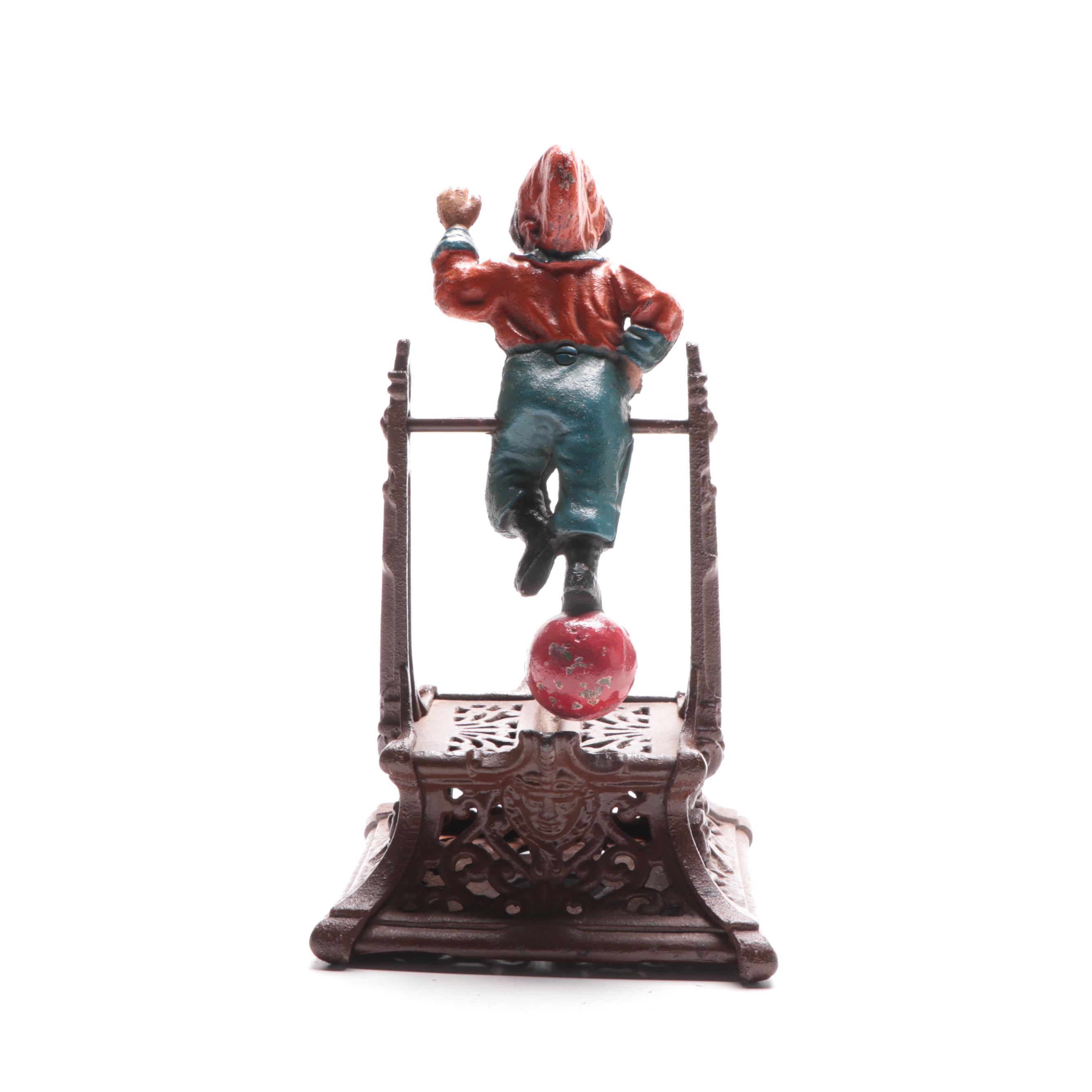 Cast Iron "Boy on Trapeze" Reproduction Bank, Late 20th Century
