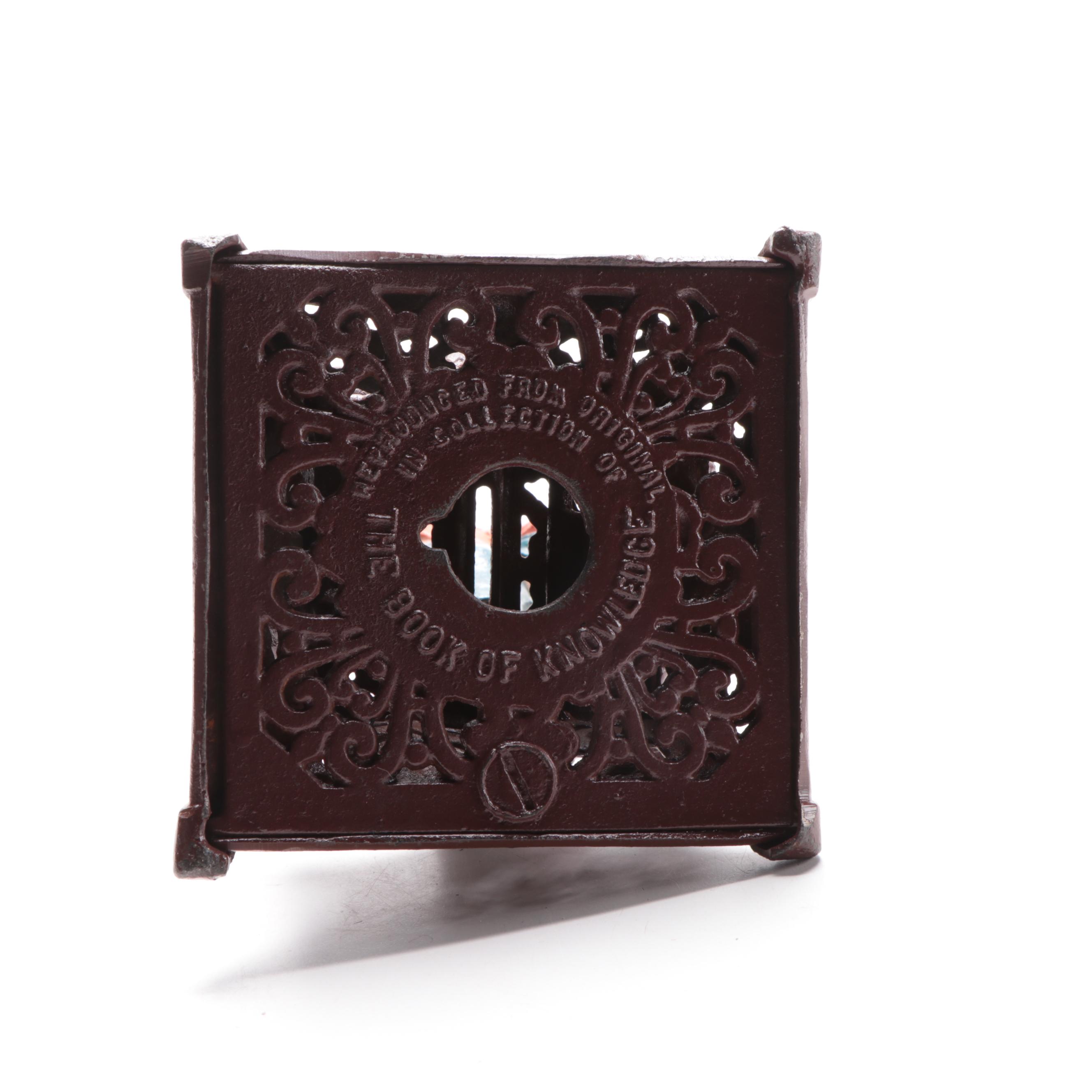 Cast Iron "Boy on Trapeze" Reproduction Bank, Late 20th Century