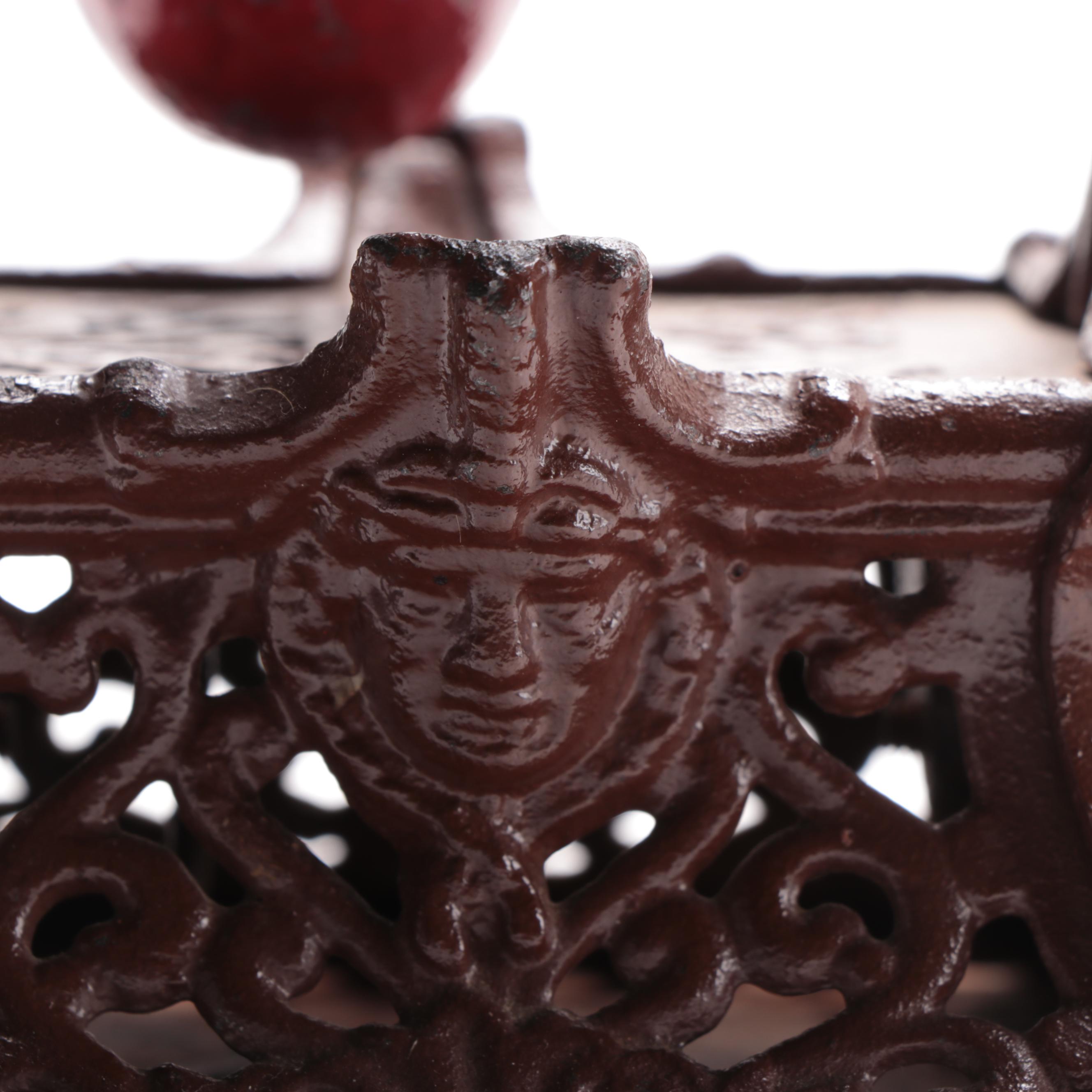 Cast Iron "Boy on Trapeze" Reproduction Bank, Late 20th Century