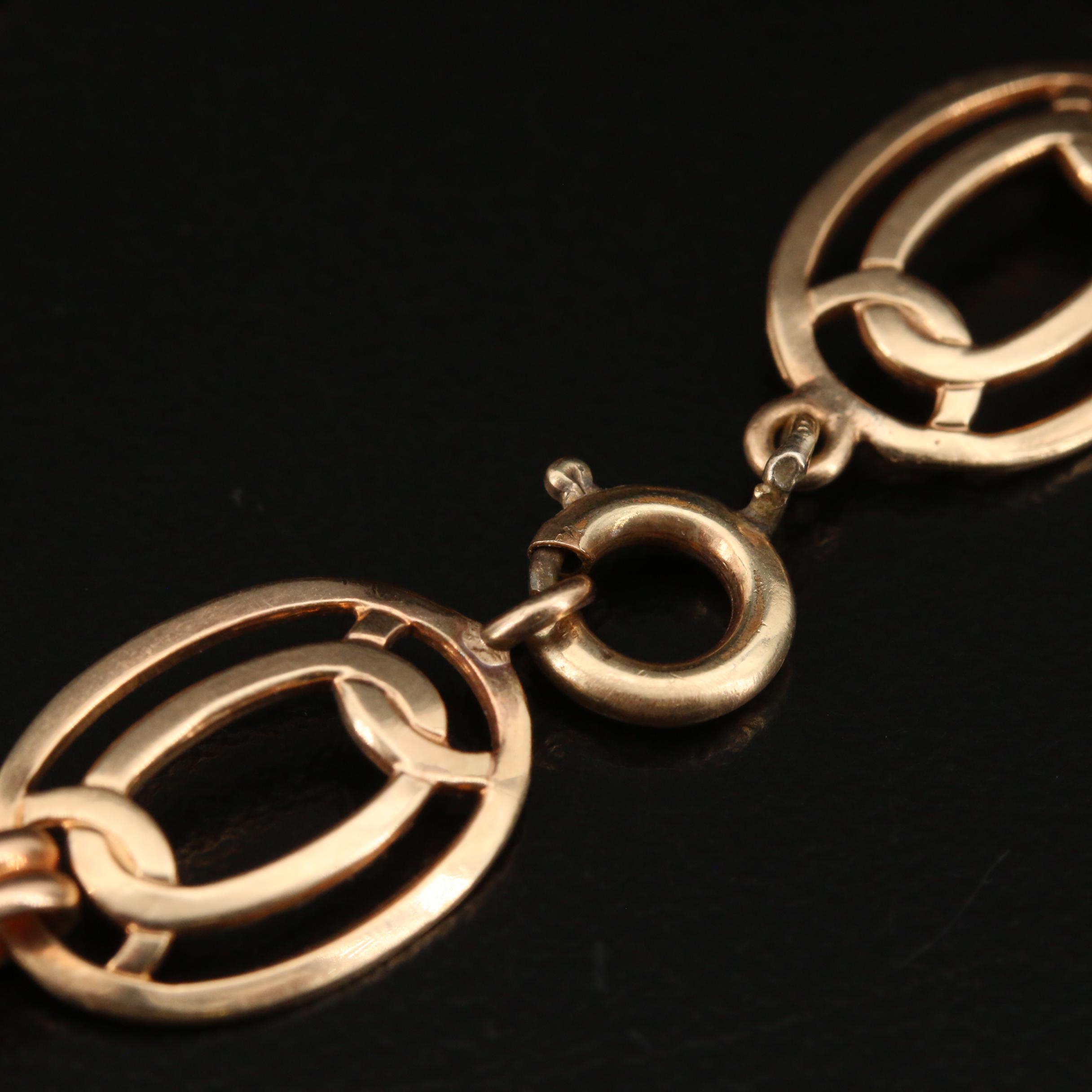 Late Art Deco 10K Diamond Oval Link Bracelet with Palladium Accents