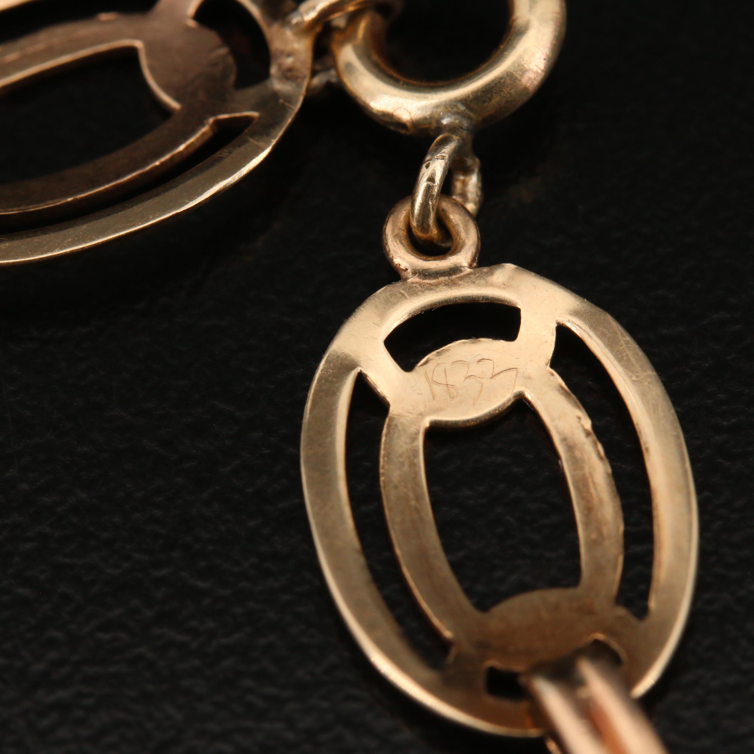 Late Art Deco 10K Diamond Oval Link Bracelet with Palladium Accents