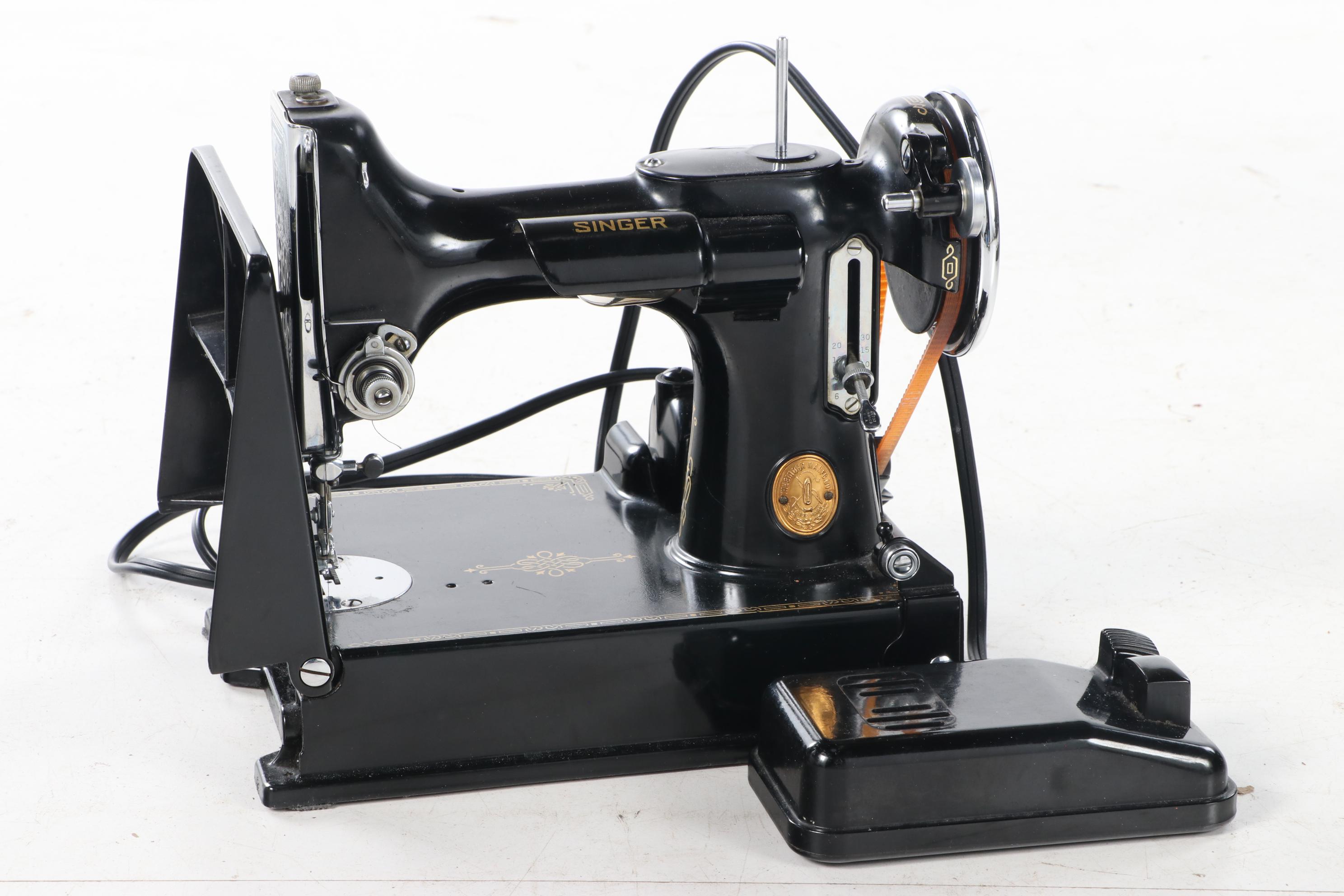 Singer "221-1" Portable Electric Sewing Machine with Accessories and Case