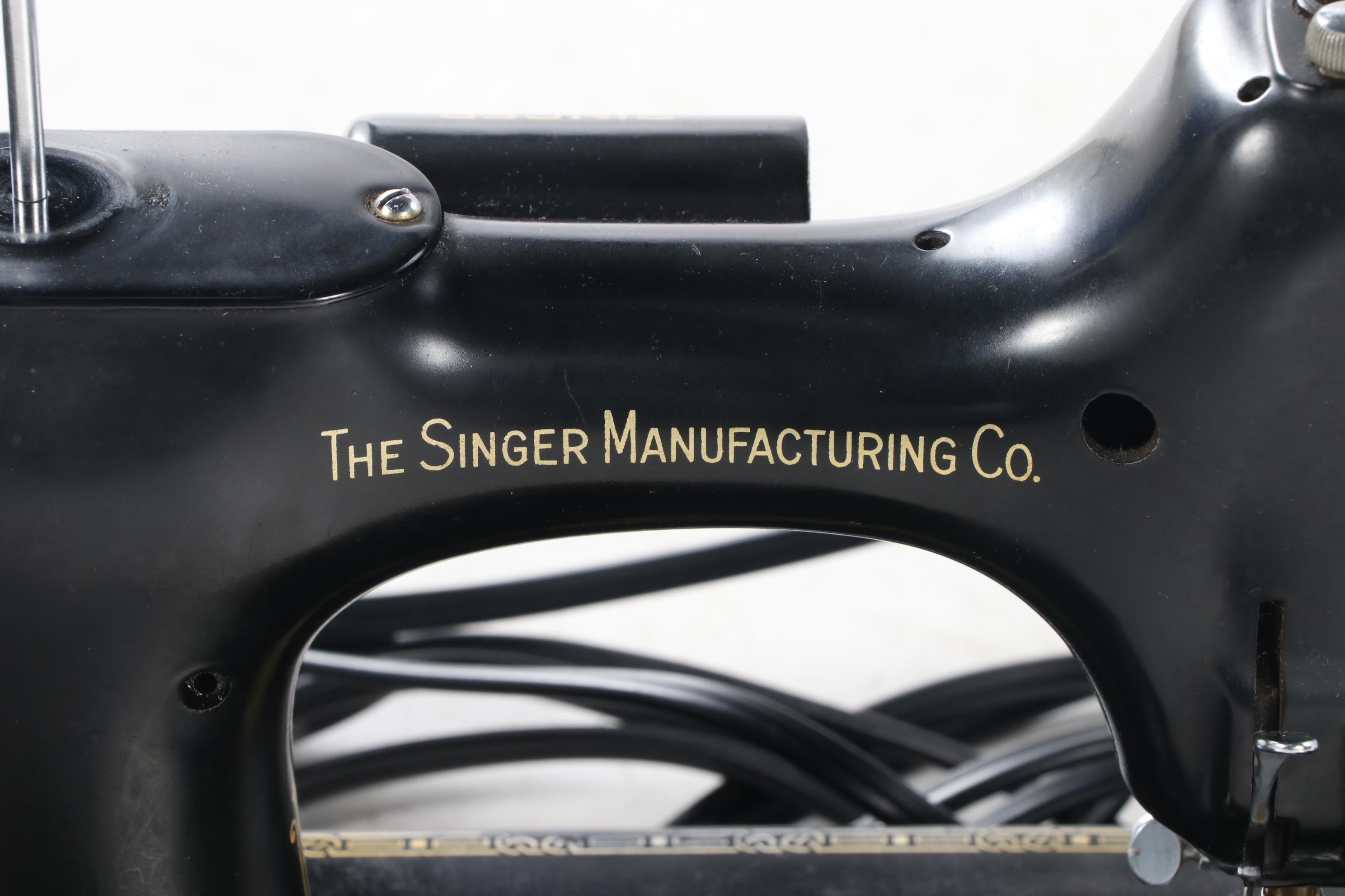 Singer "221-1" Portable Electric Sewing Machine with Accessories and Case