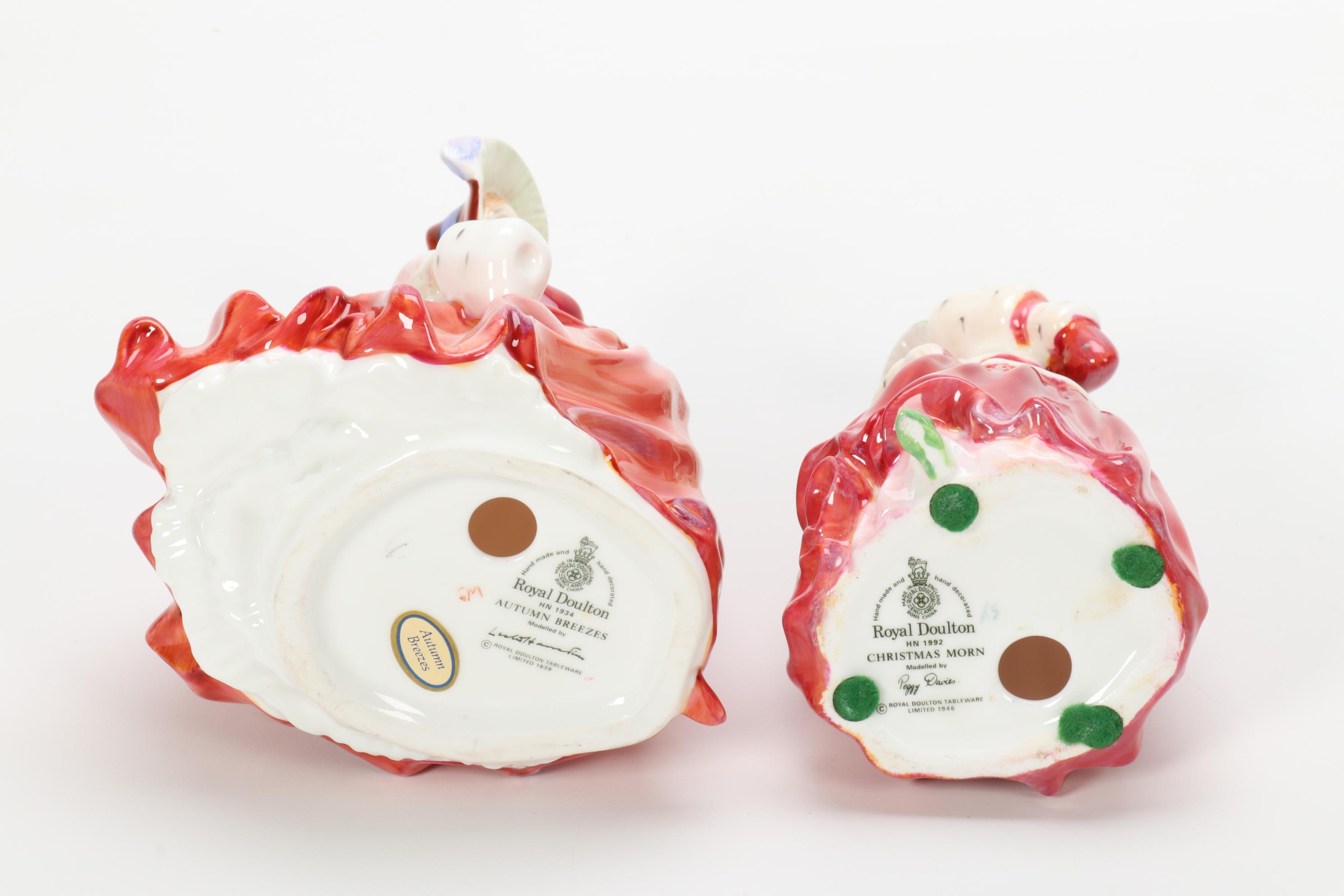 Royal Doulton "Christmas Morn" and "Autumn Breezes" Porcelain Figurines