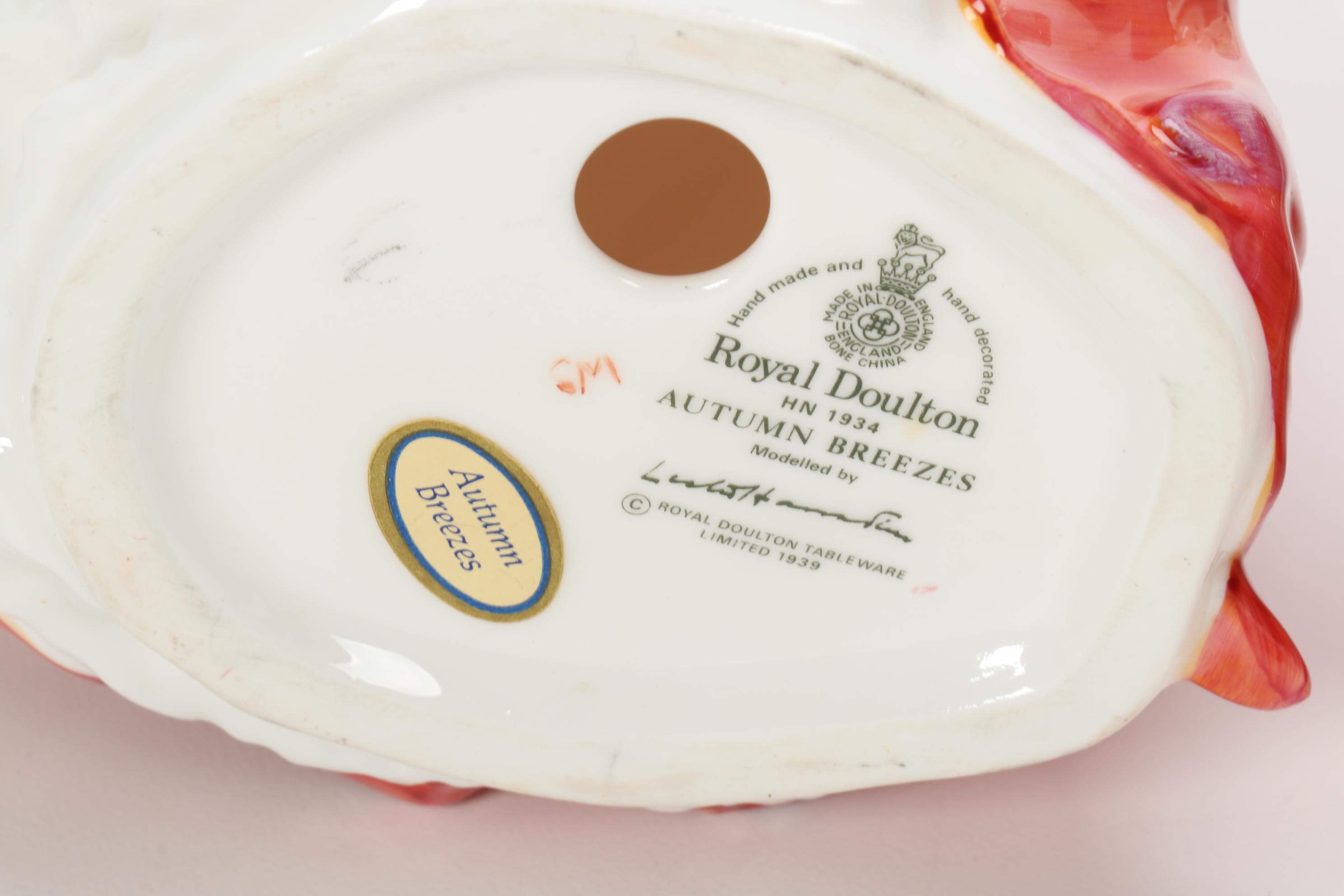 Royal Doulton "Christmas Morn" and "Autumn Breezes" Porcelain Figurines