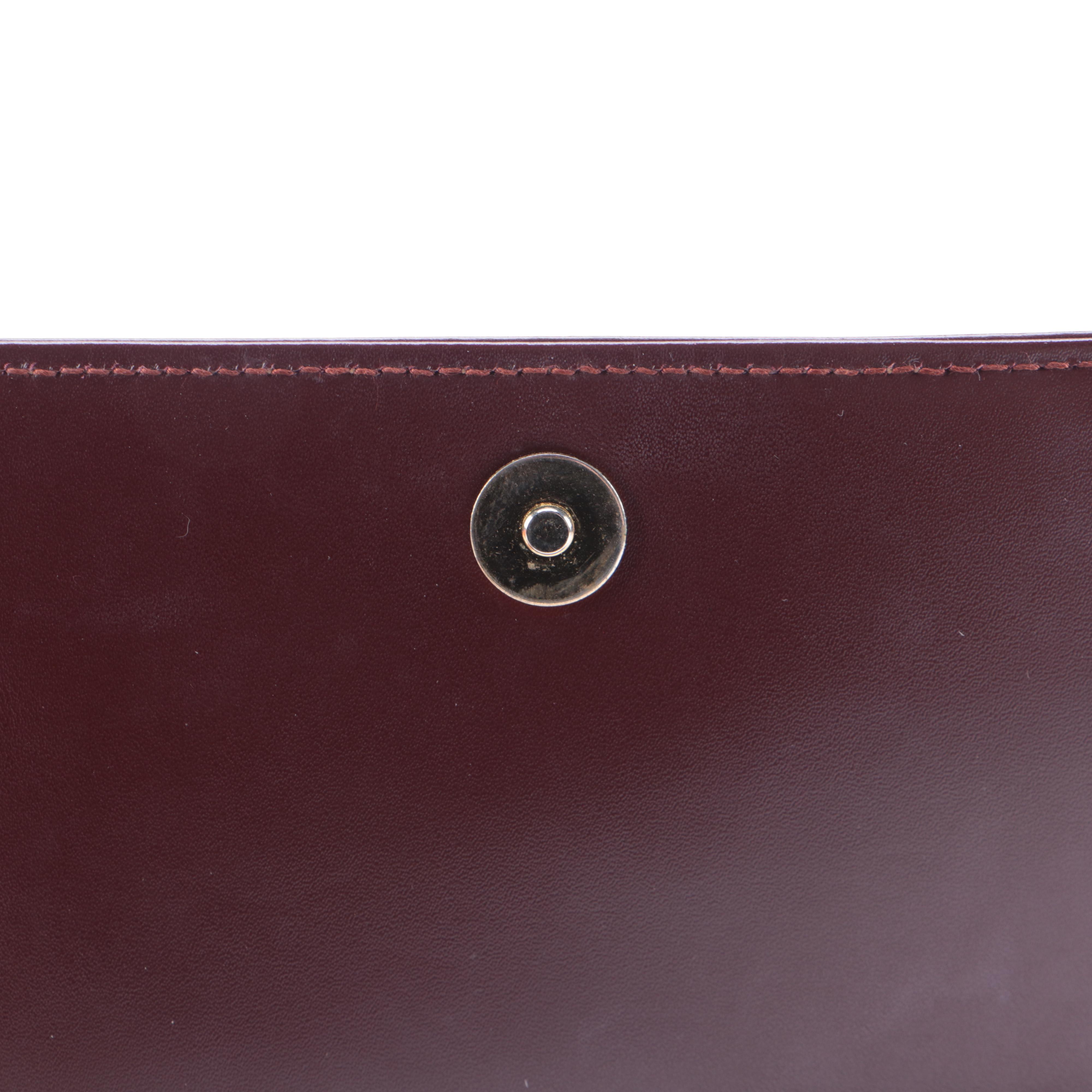 Must du Cartier Clutch in Burgundy Leather