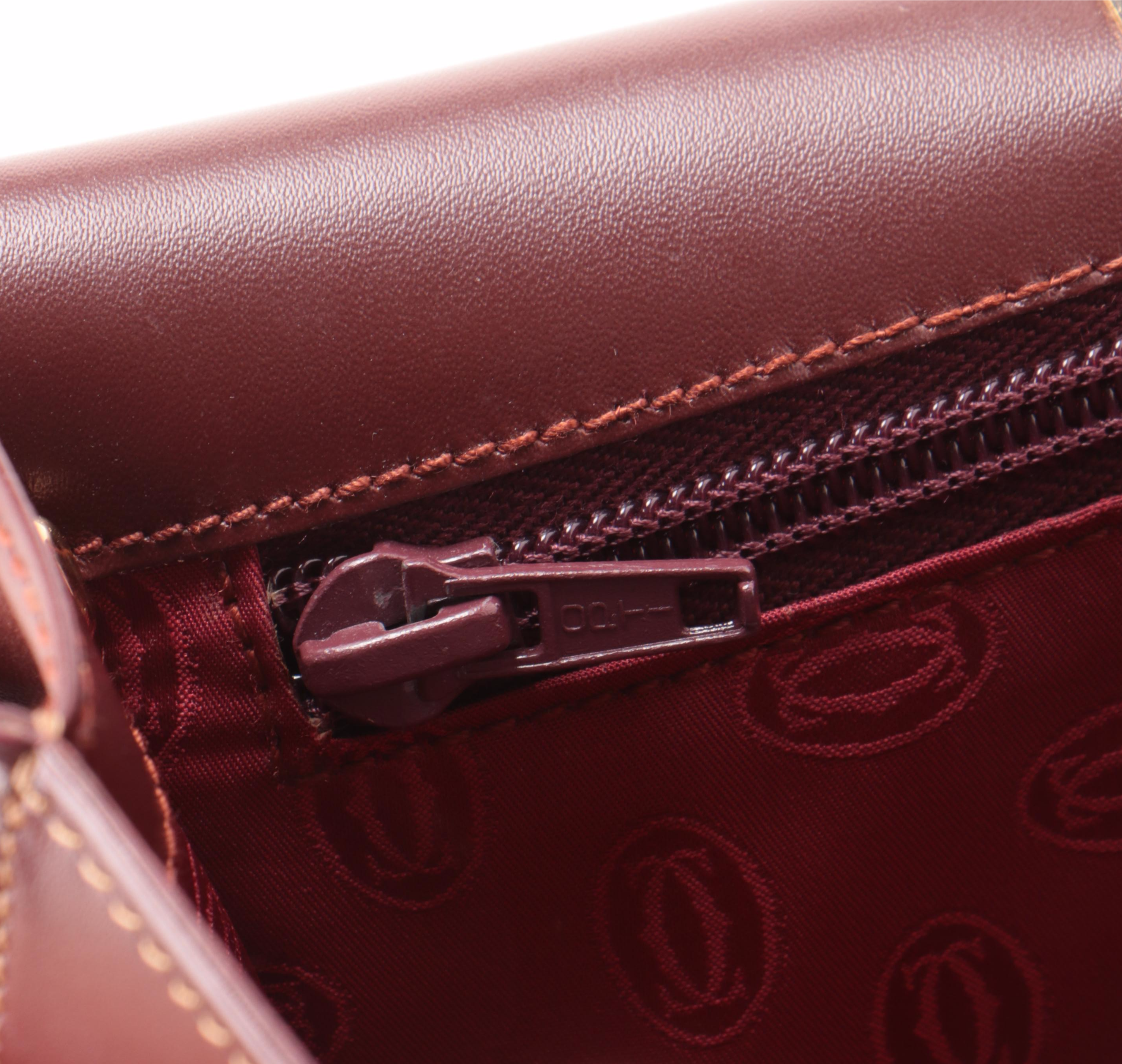 Must du Cartier Clutch in Burgundy Leather