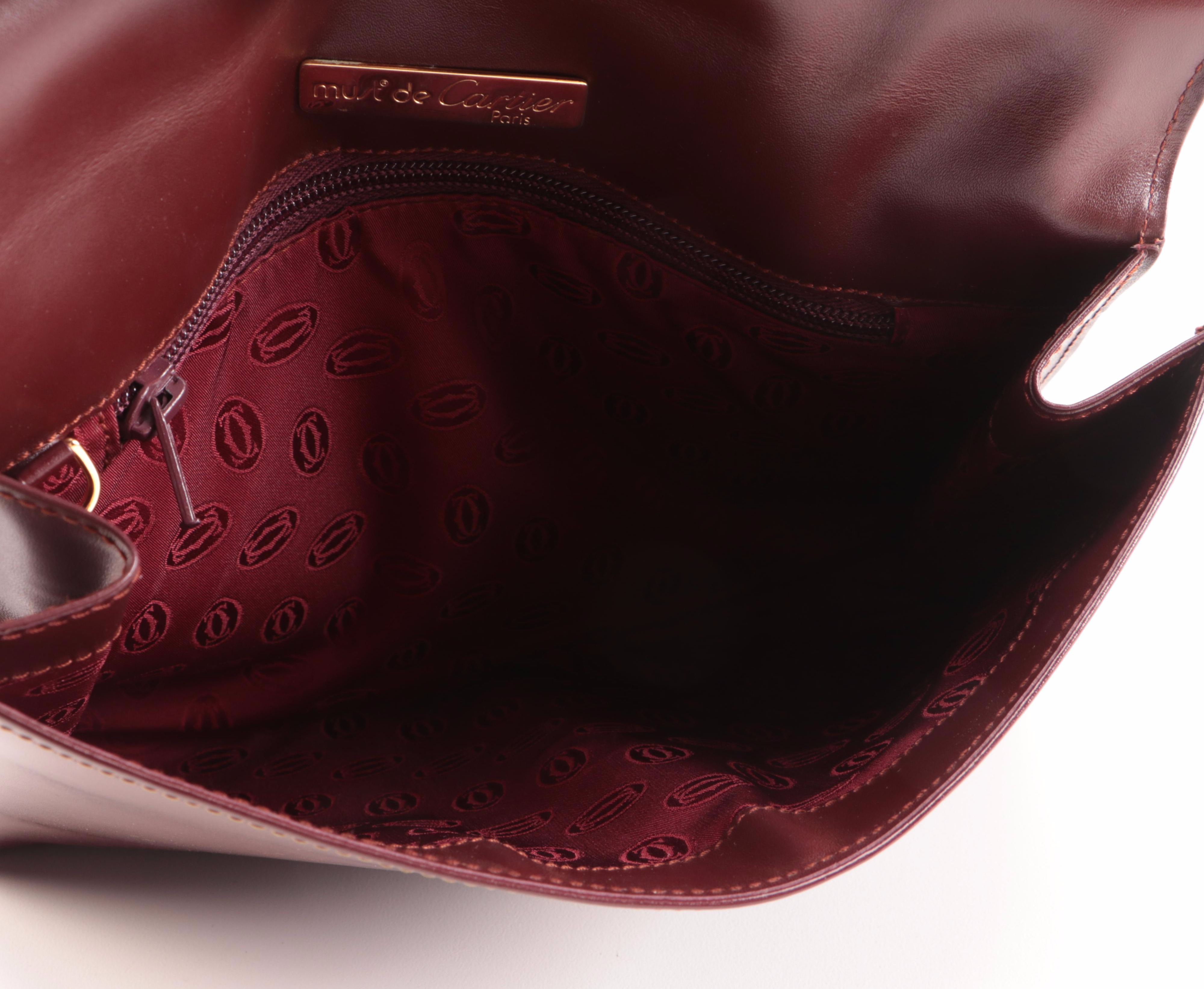 Must du Cartier Clutch in Burgundy Leather