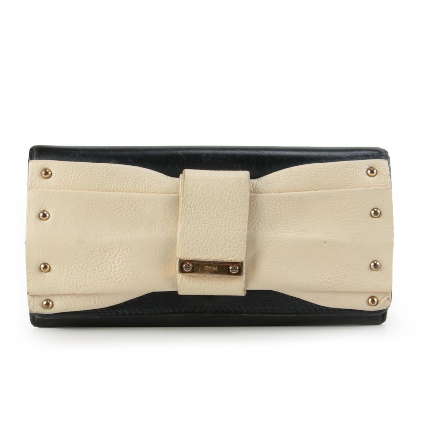 Chloè June Bow Embellished Folio Wallet in Black and Ivory Leather